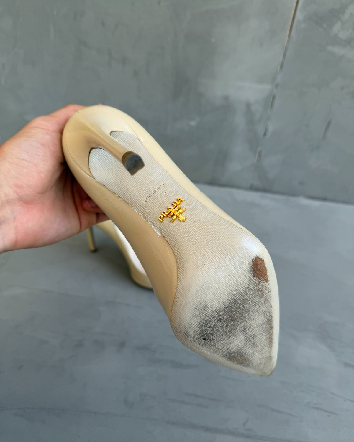 Prada Cream Leather High Heels – EU 37.5-on a concrete background