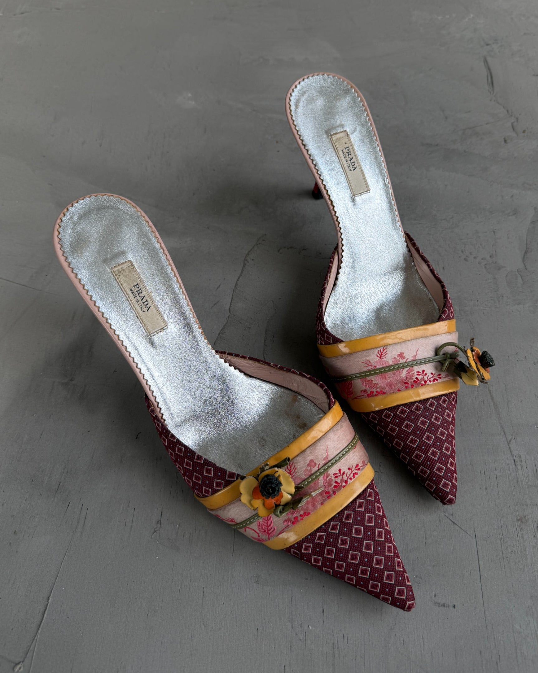 Prada Silk Embellished Kitten Heels – EU 37.5-on a concrete background
