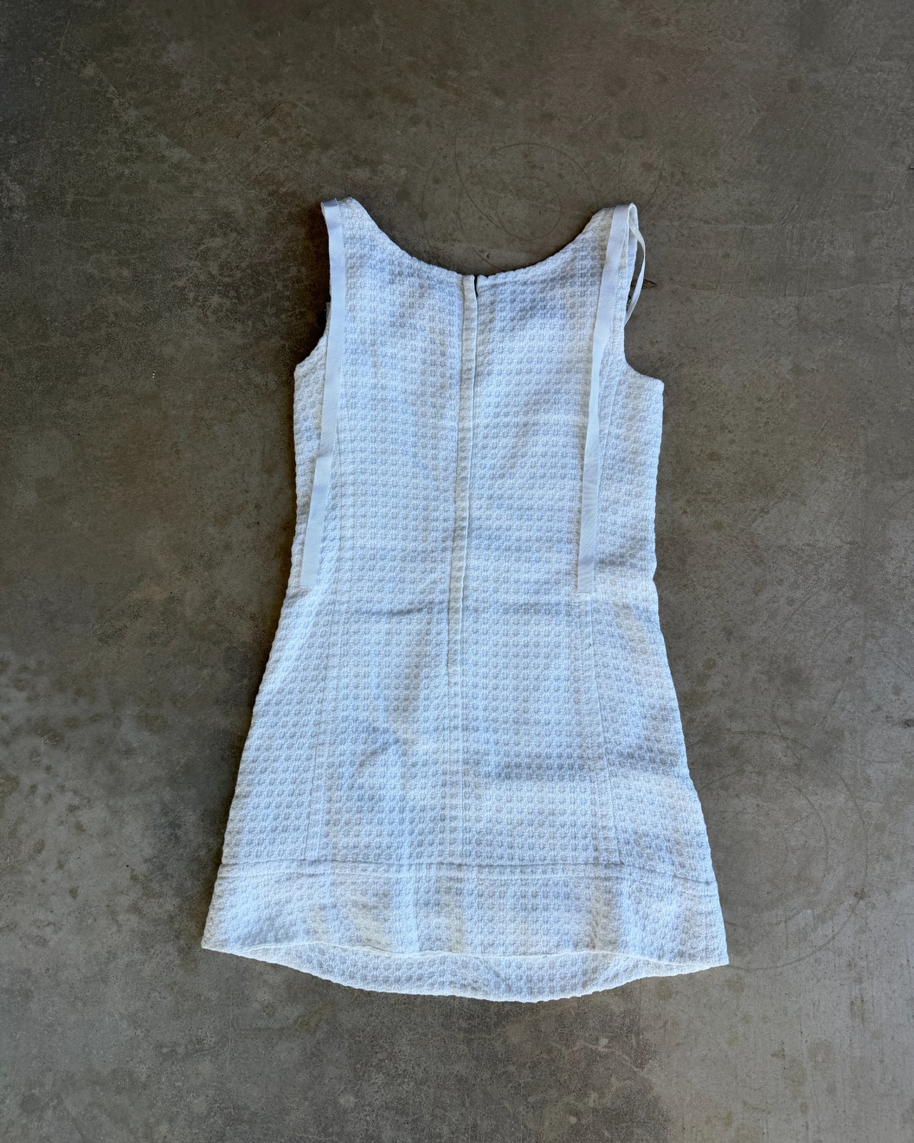Prada SS2010 White Cotton Mini Dress-on a concrete background