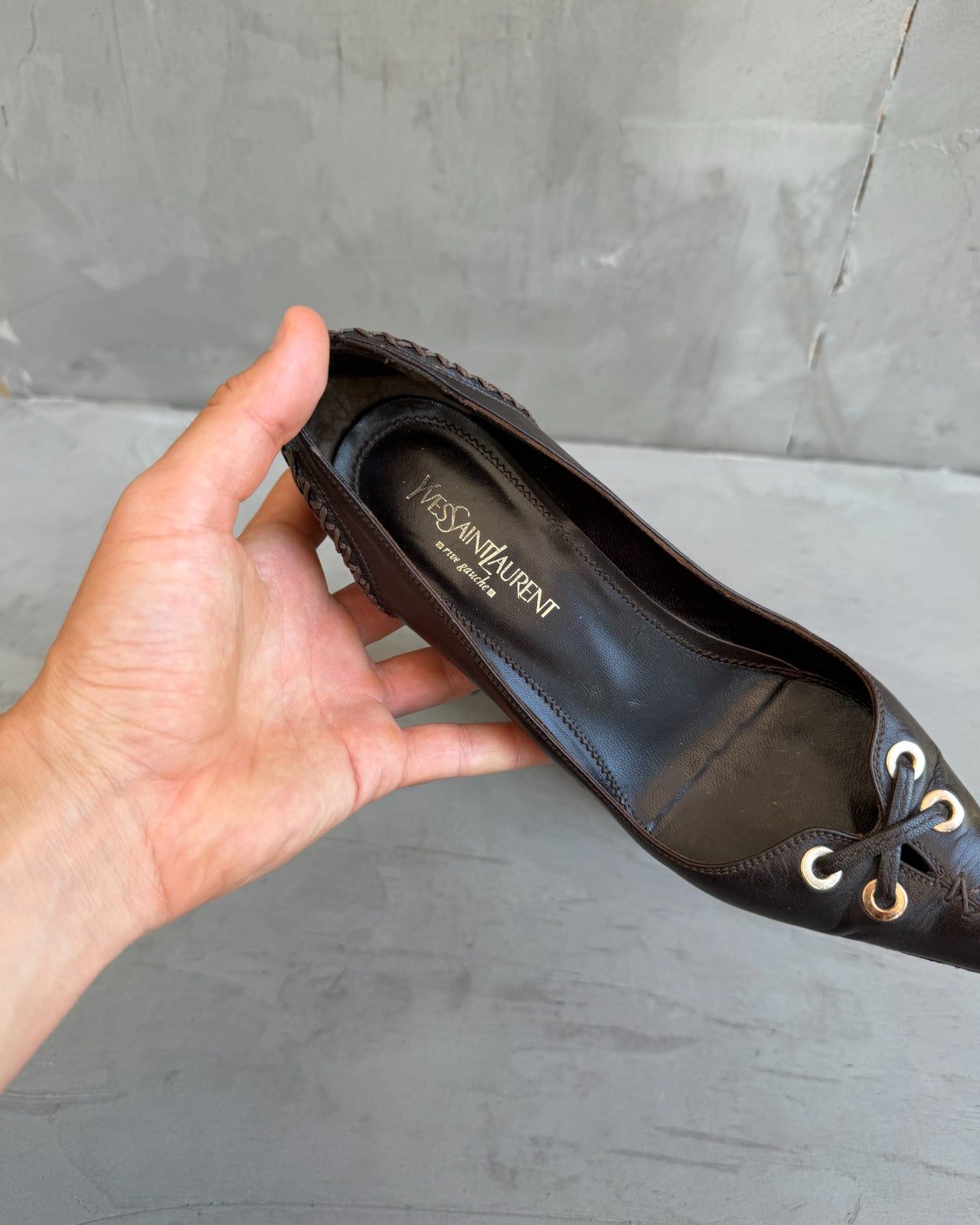 Yves Saint Laurent Rive Gauche Brown Leather Heels – EU 38-on a concrete background