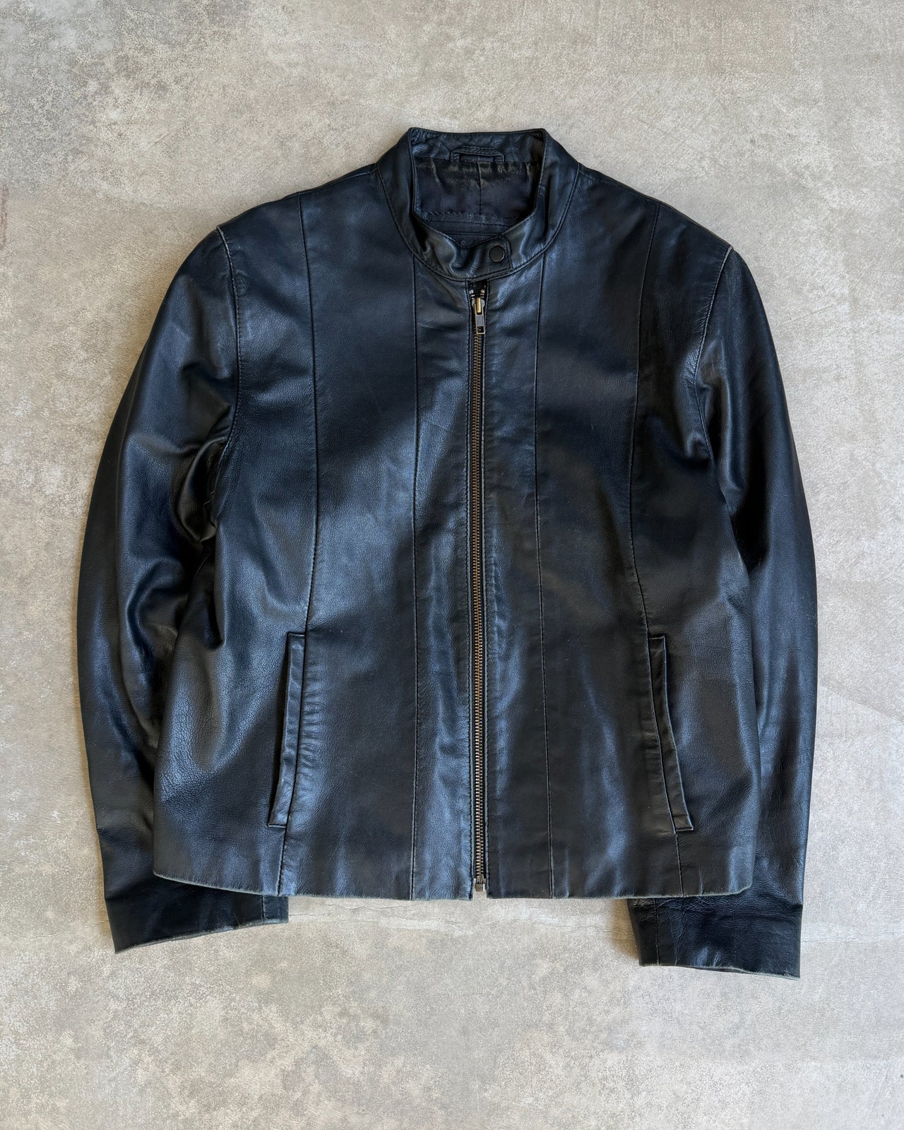 Pallas Cuir Boxy Black Leather Jacket – S/M-on a concrete background