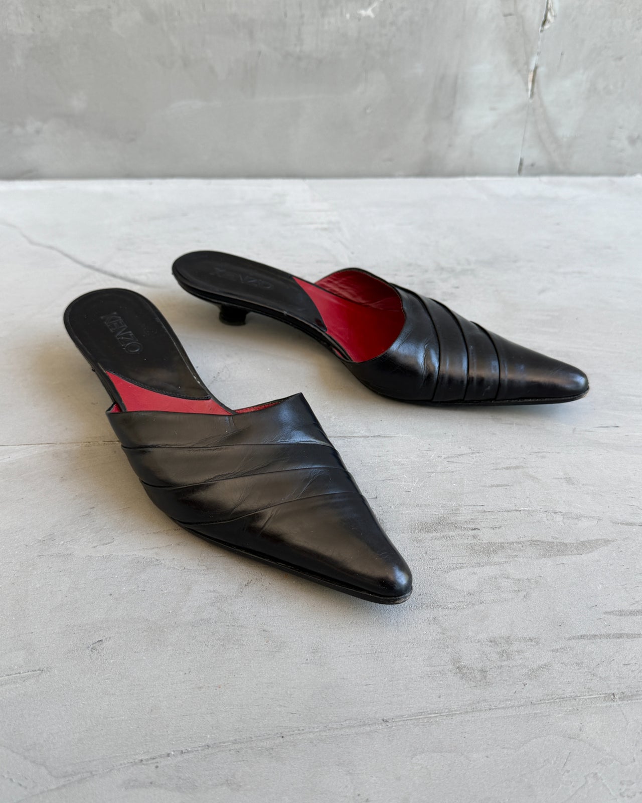 Kenzo Black Leather Kitten Heel Mule – EU 36.5-on a concrete background