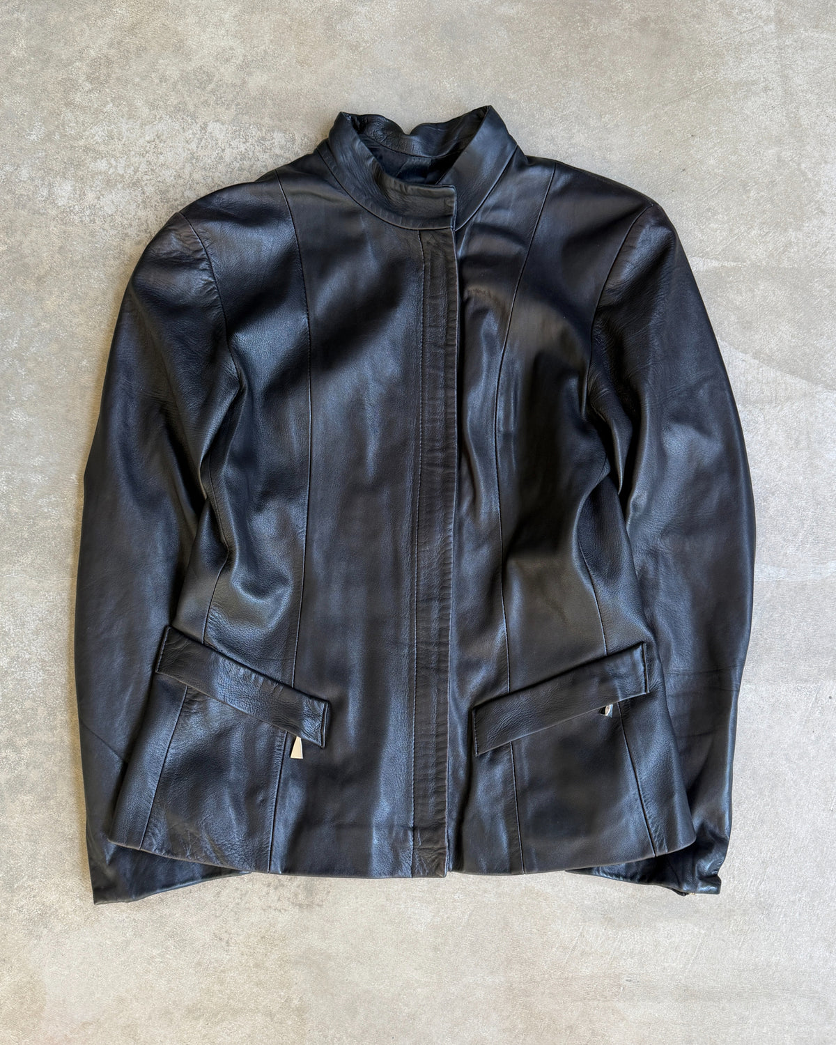 Giorgio Black Leather Jacket – XS/S-on a concrete background