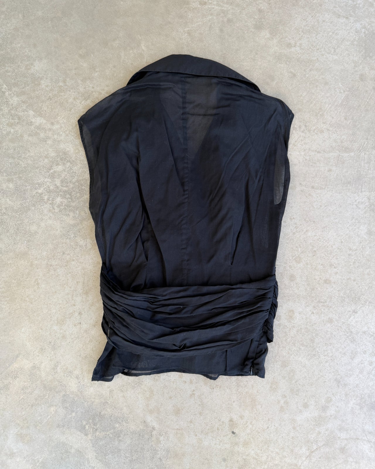 Salvatore Ferragamo Black Cotton Asymmetric Collared Top – S-on a concrete background