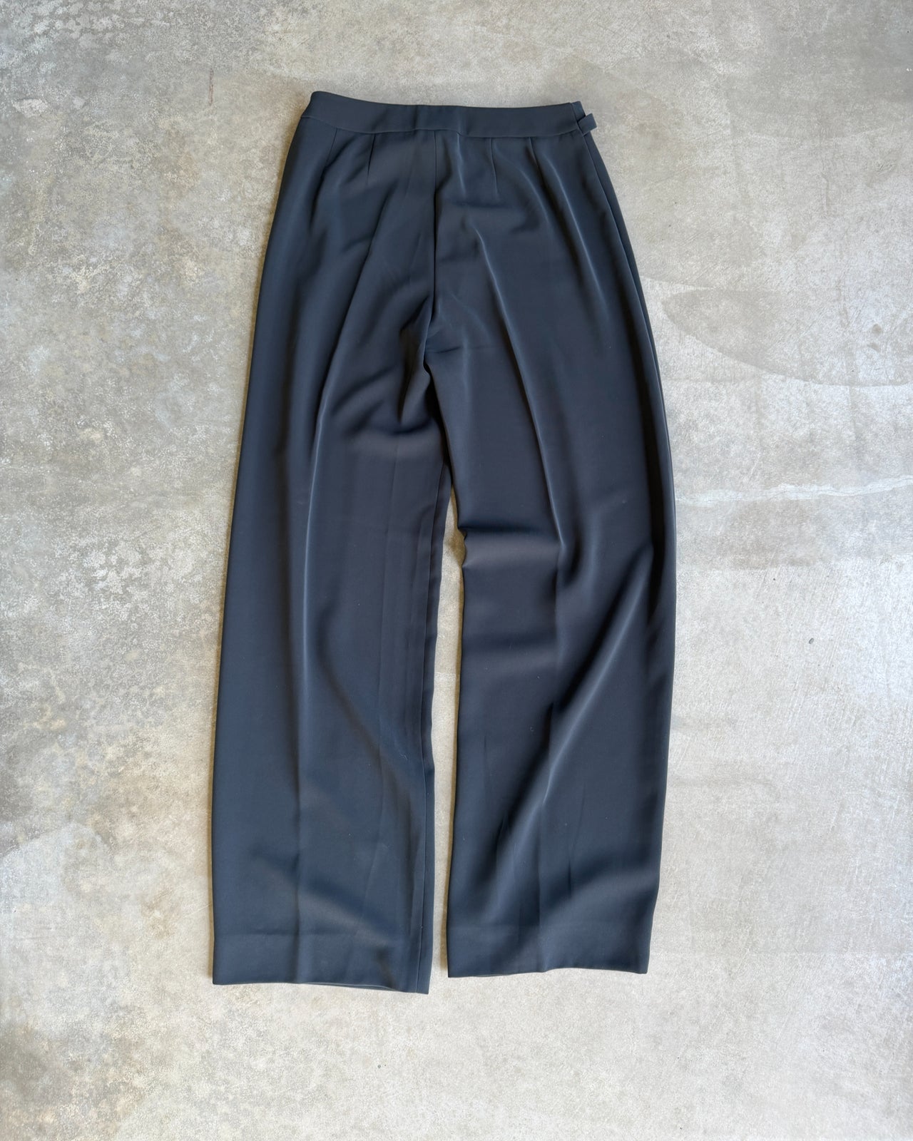 Giorgio Armani Grey Polyester Wide Leg Trousers – M-on a concrete background