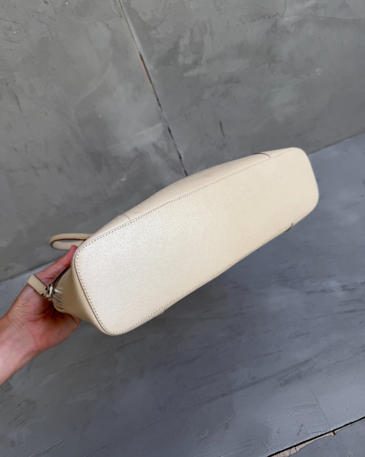 Gucci Beige Structured Leather Handbag-on a concrete background