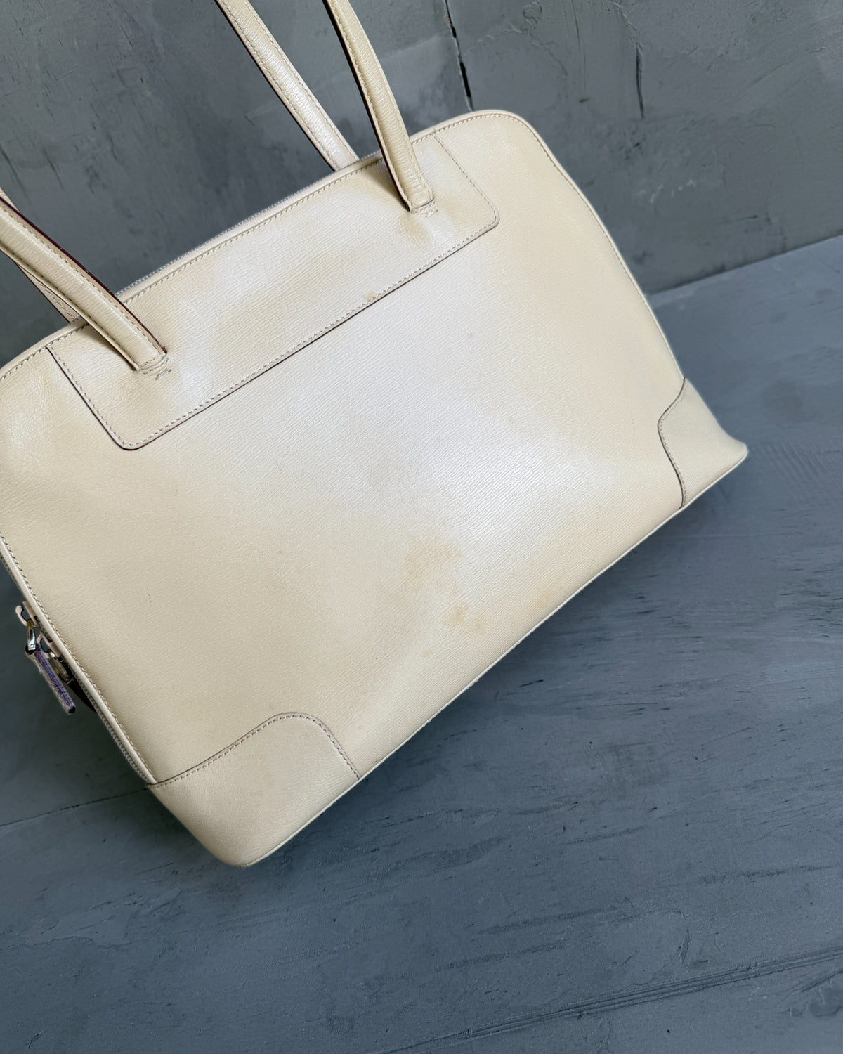 Gucci Beige Structured Leather Handbag-on a concrete background
