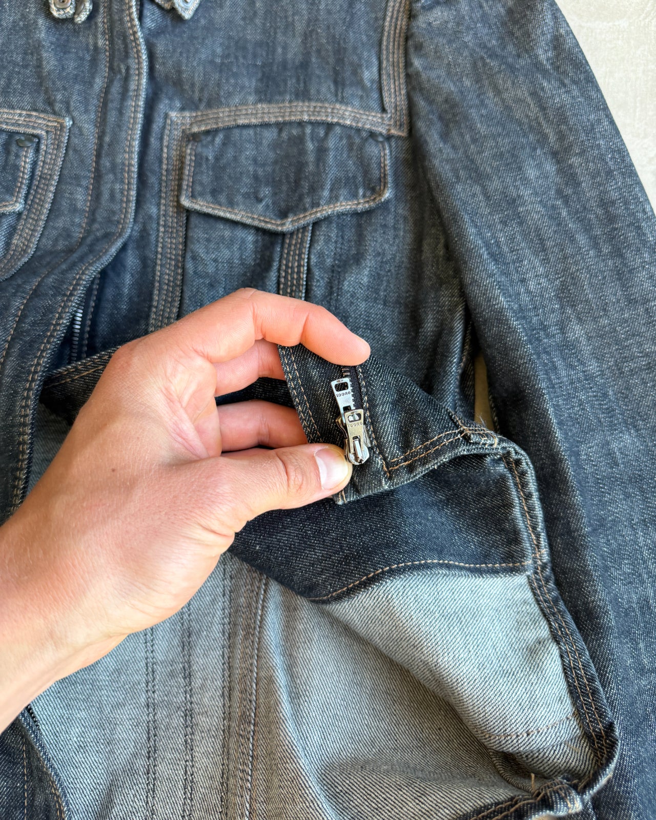 Gucci 2002 by Tom Ford Denim Jacket – S-on a concrete background