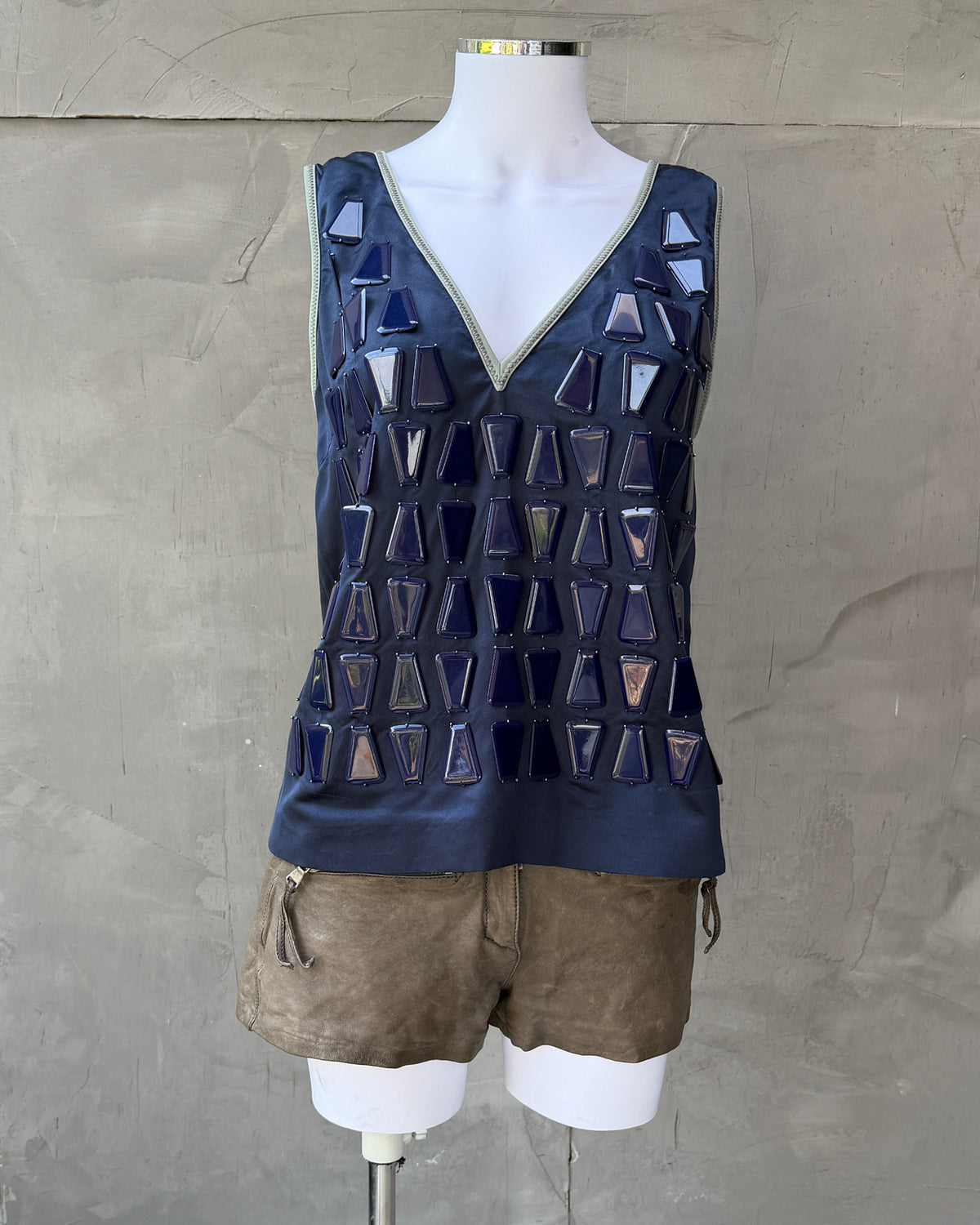 Prada Blue Silk Beaded Vest – S-on a concrete background