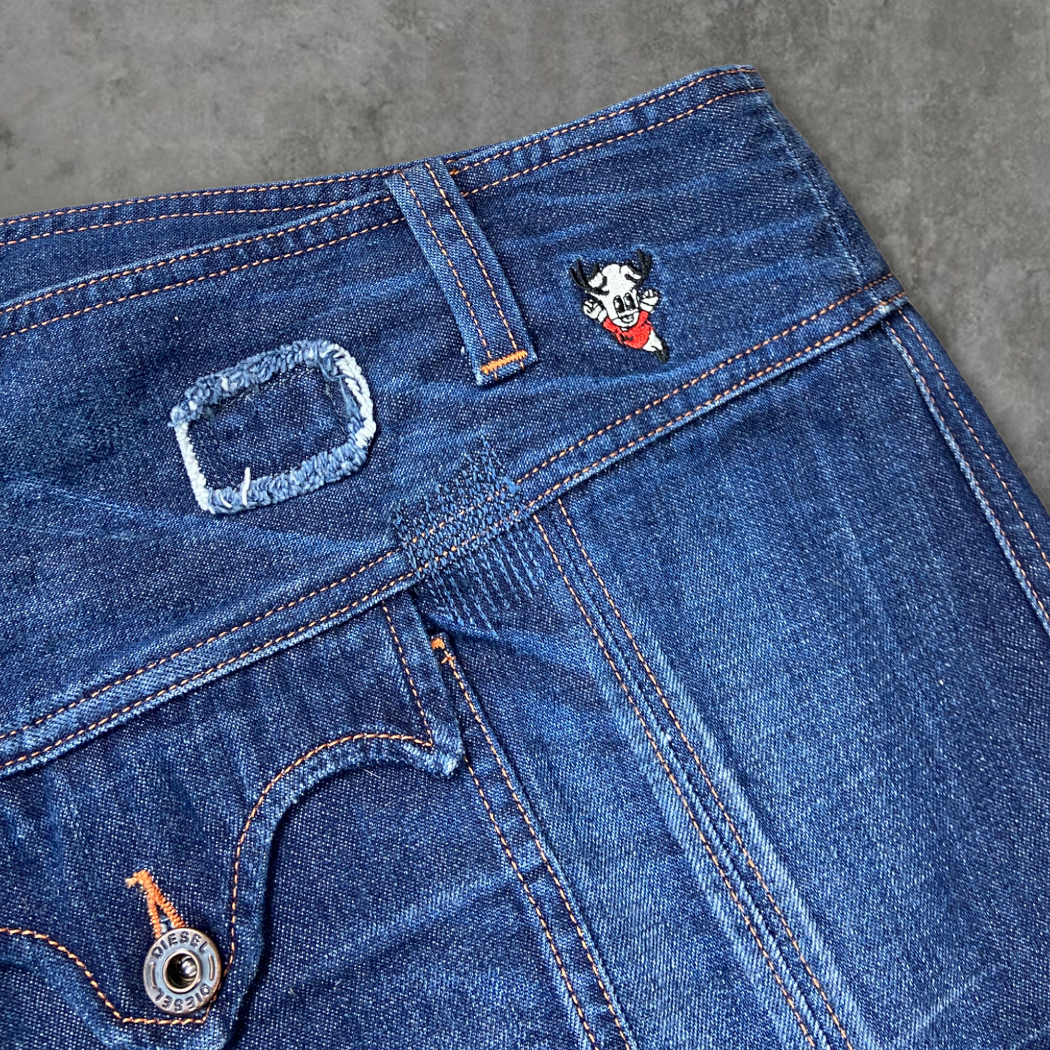 DIESEL DENIM ASYMMETRIC WRAP MINI SKIRT - W30"