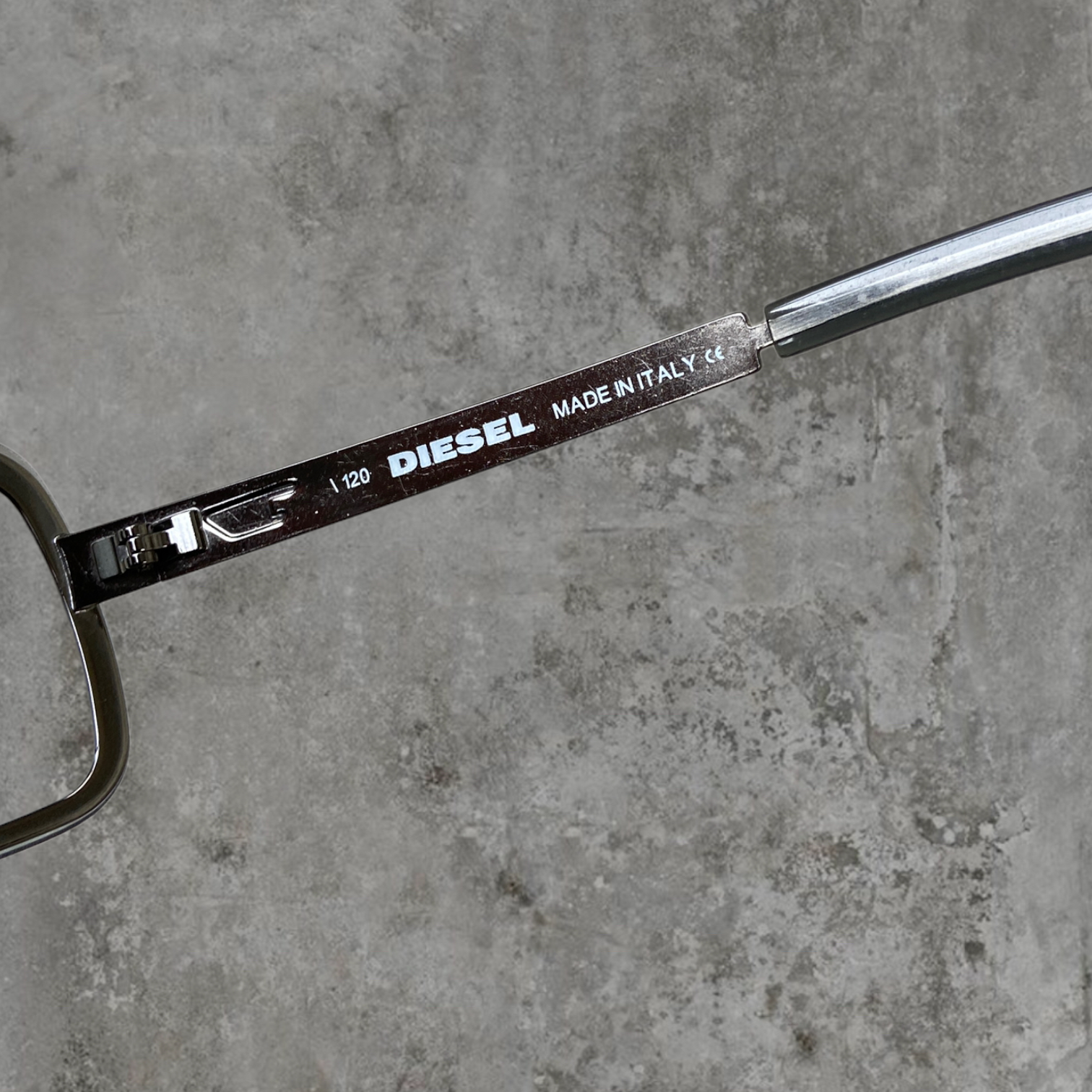 DIESEL RIMLESS WRAP SPORT SUNGLASSES