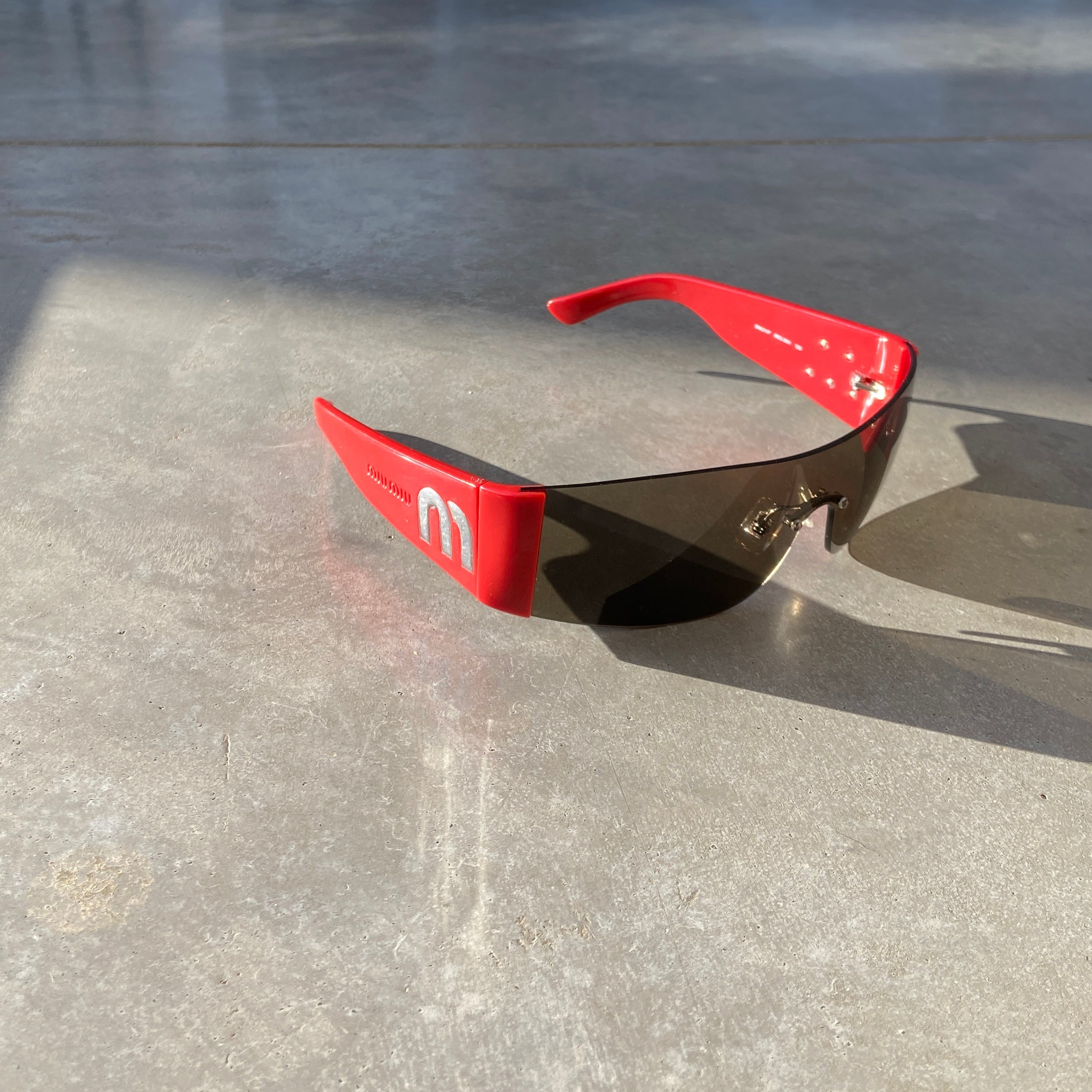 MIU MIU SPORT WRAP SUNGLASSES