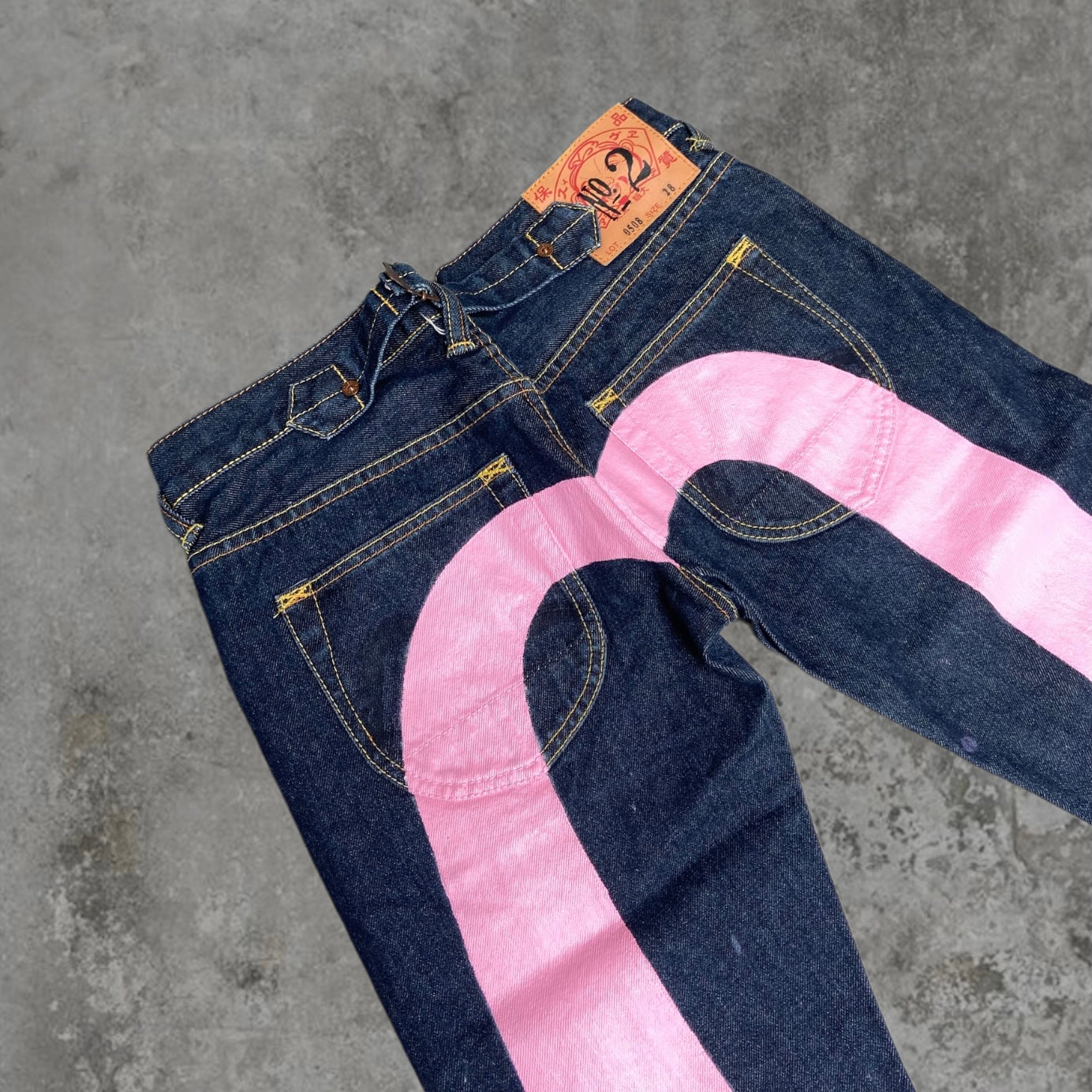EVISU LOW-RISE PINK DAICOCK SELVEDGE JEANS - W27"