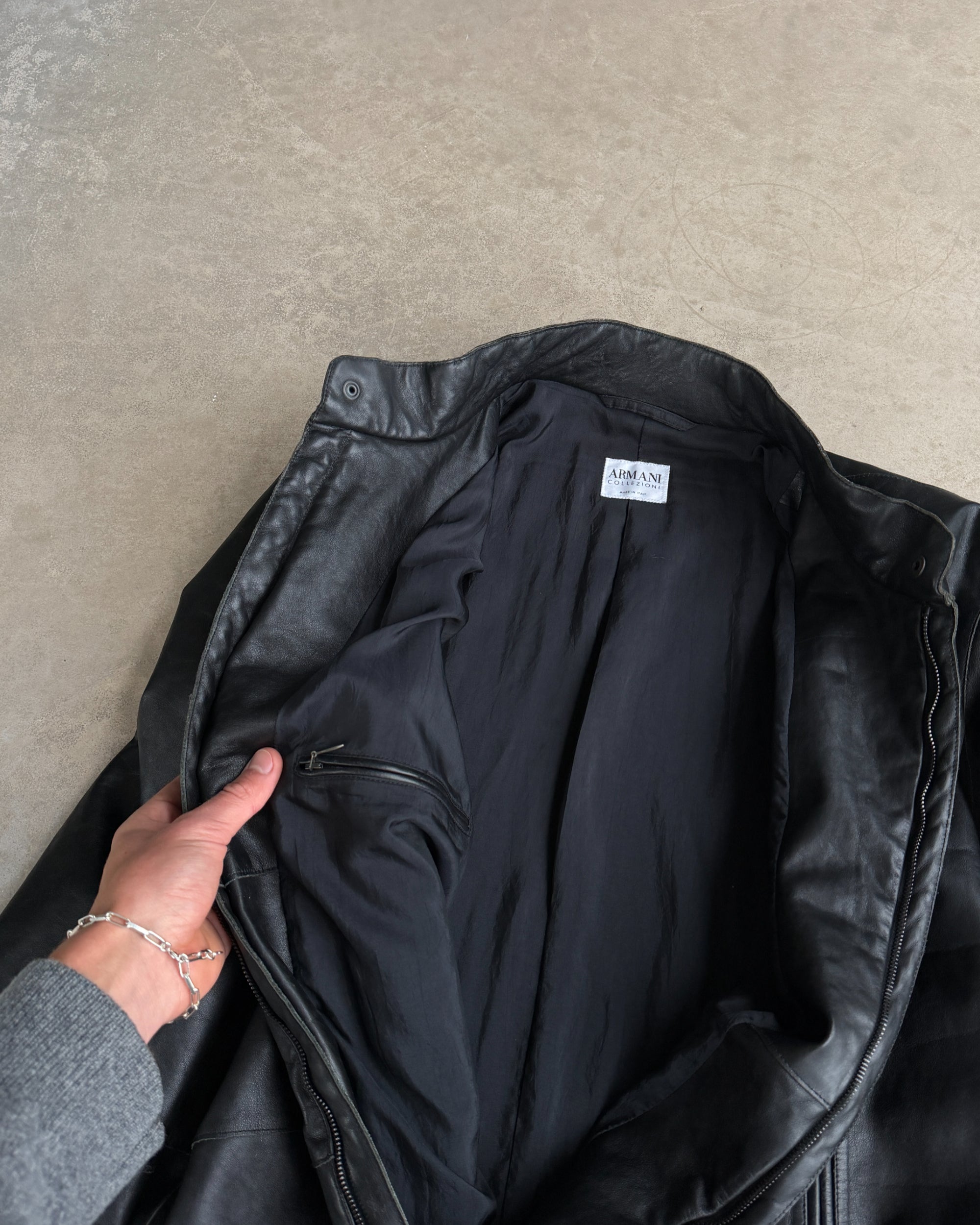 Armani Collezioni Calfskin Leather Jacket – M–L-on a concrete background