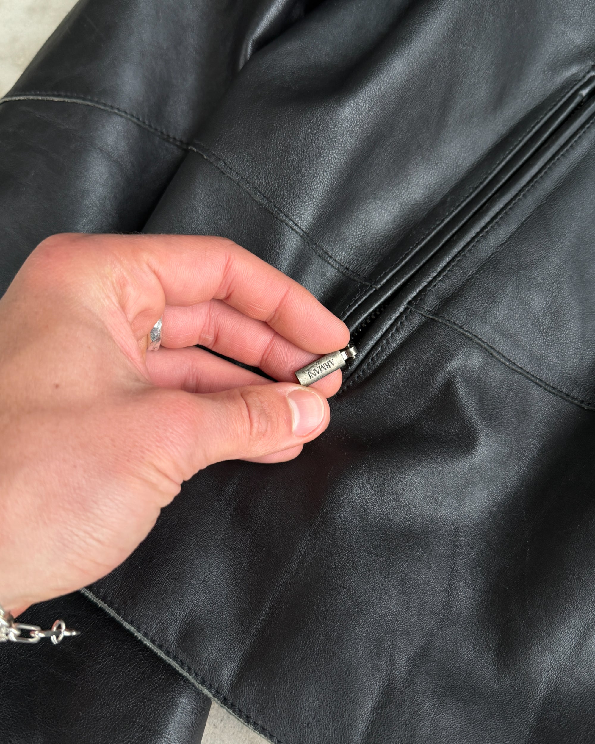 Armani Collezioni Calfskin Leather Jacket – M–L-on a concrete background