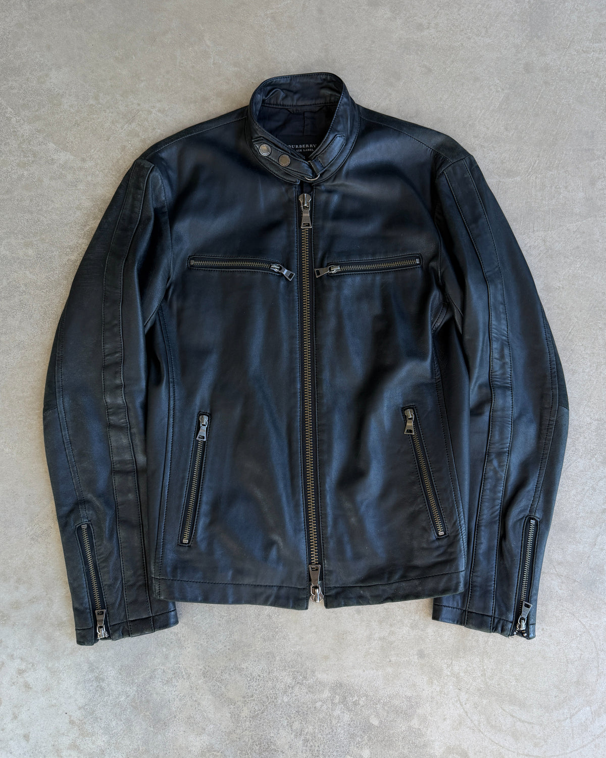 Burberry Black Label Lightweight Leather Jacket – M-on a concrete background