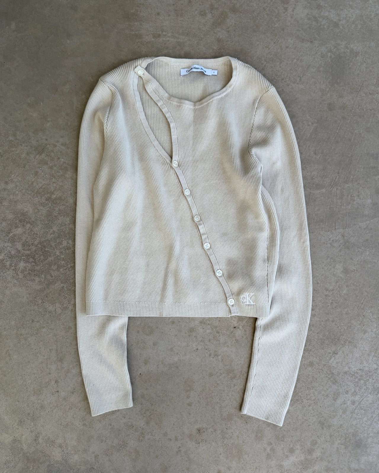 Calvin Klein Jeans Ribbed Asymmetric Long Sleeve Cardigan – S-on a concrete background