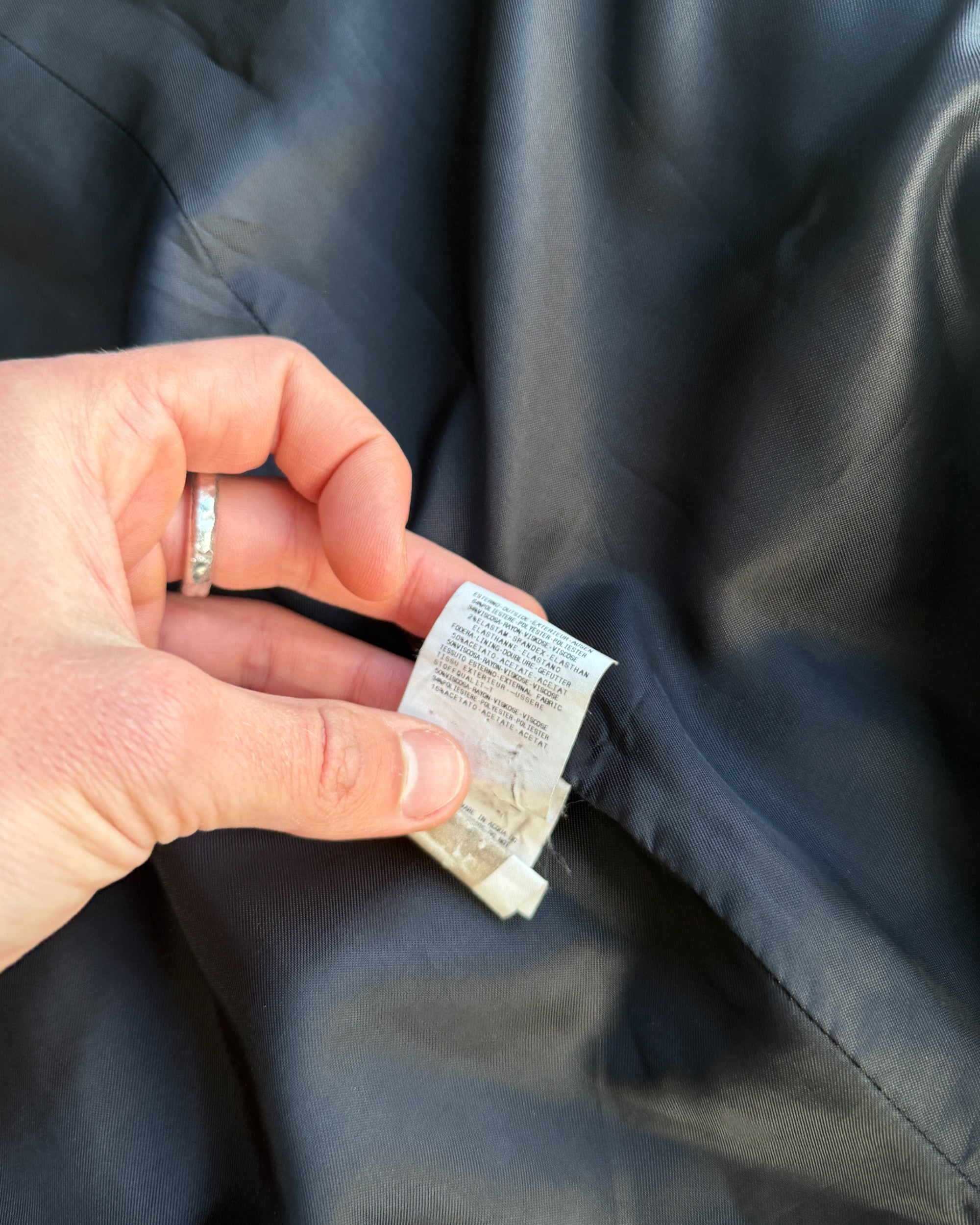 GF FERRE Wool Overcoat – M-on a concrete background