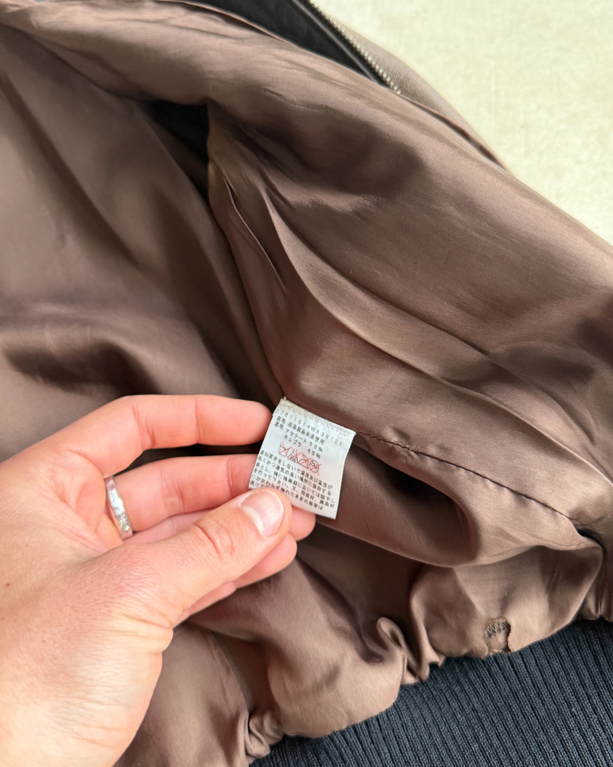 Celine Early 2000s Sheep Leather Bomber Jacket – S-on a concrete background