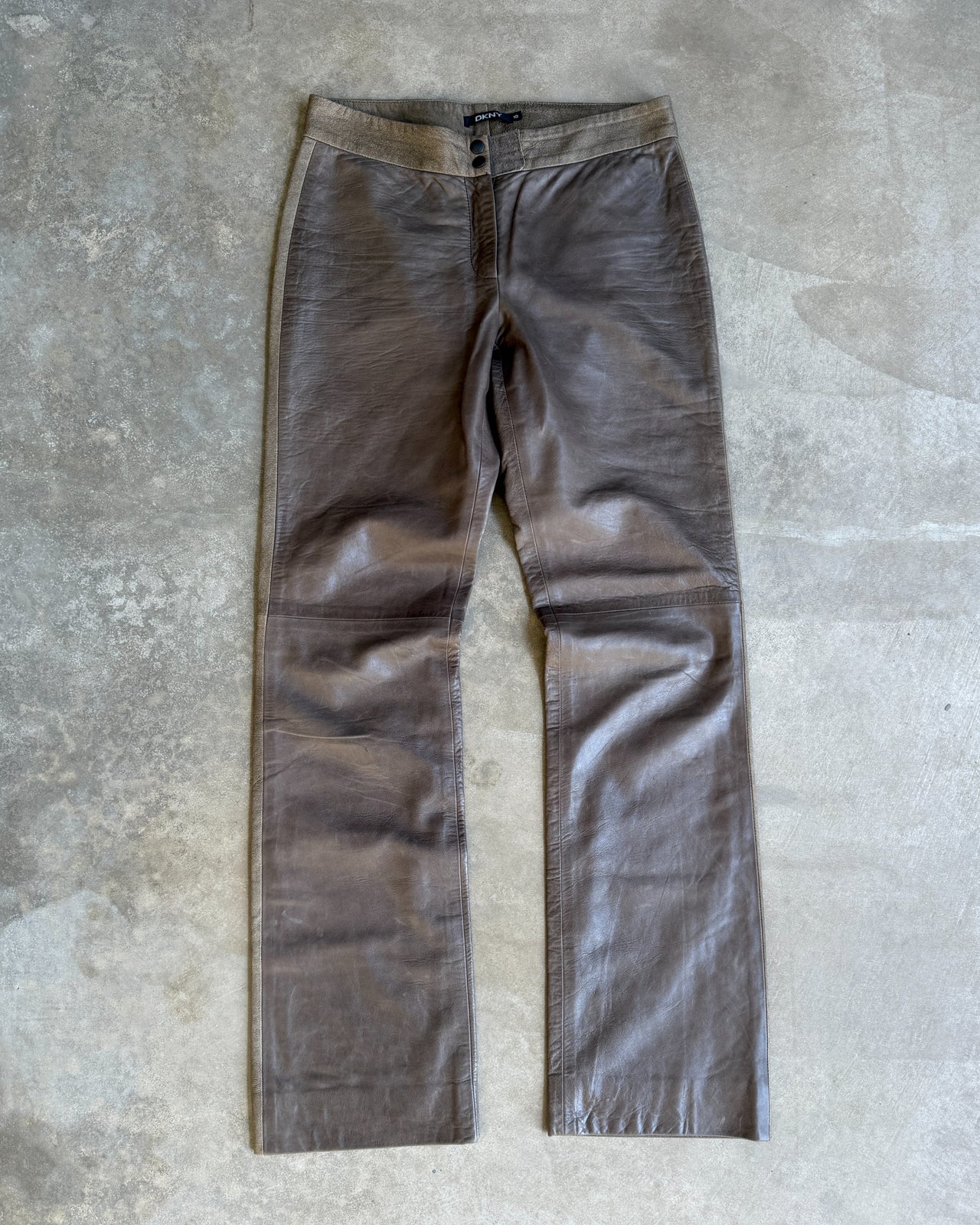 DKNY Brown Two Tone Wide Leg Leather Trousers – S/M-on a concrete background