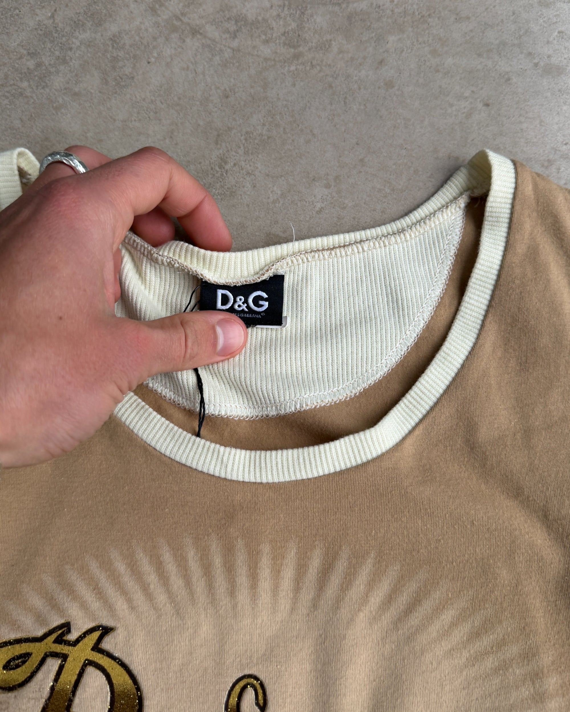 Dolce & Gabbana D&G “Bisexual” Vest Top – S-on a concrete background