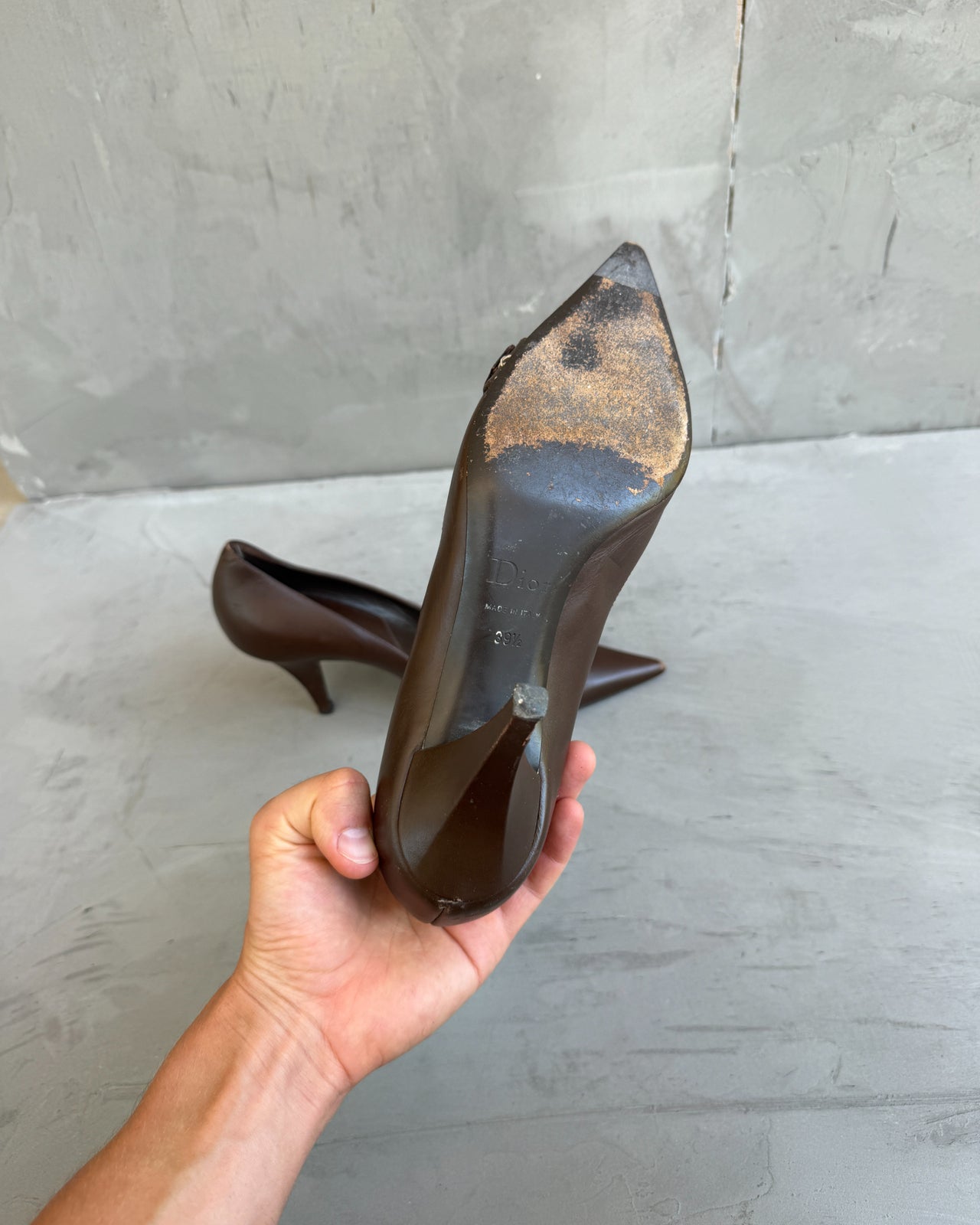 Christian Dior Brown Leather High Heel – EU 39.5-on a concrete background