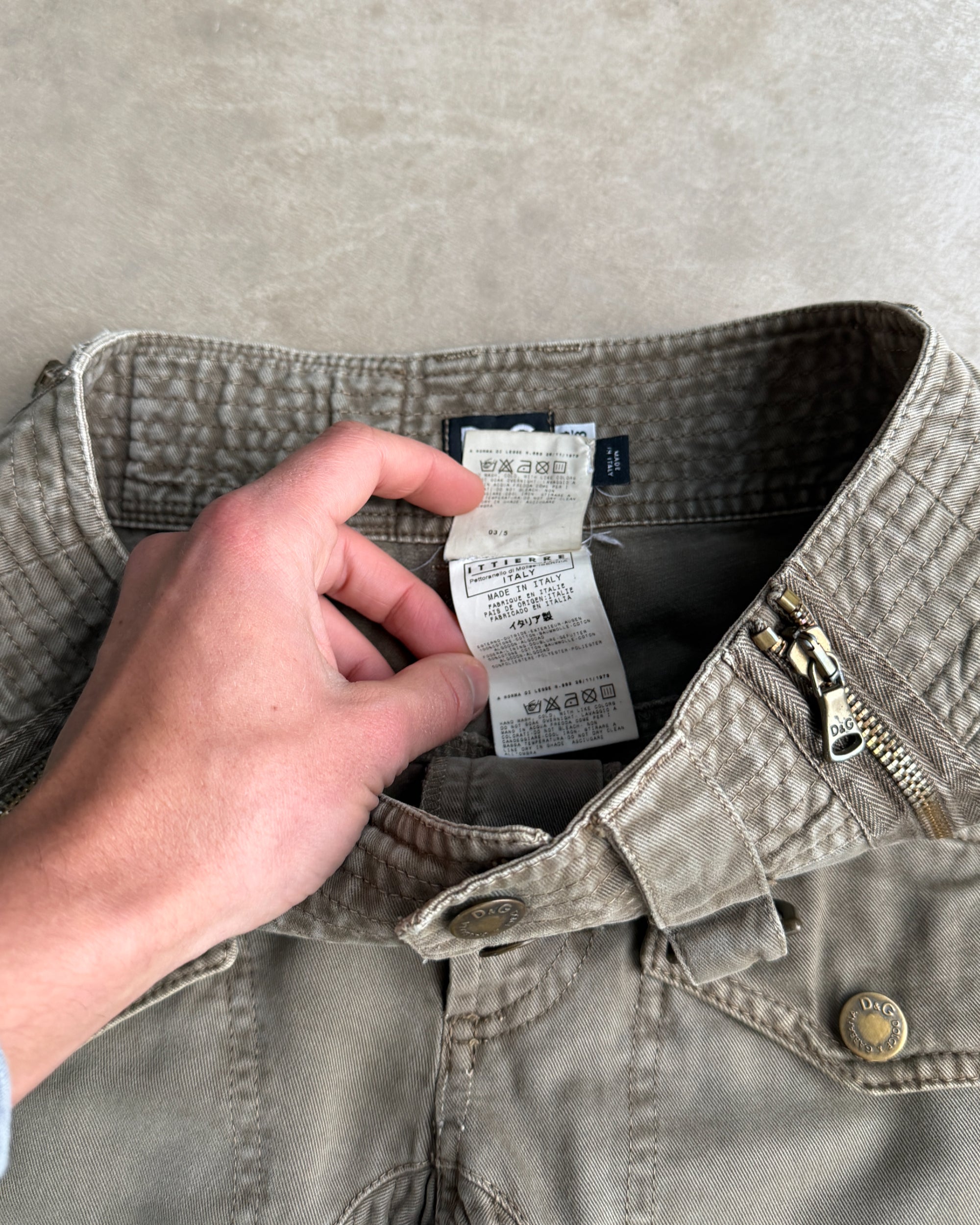 Dolce and Gabbana D&G Cargo Zipper Trousers – S-on a concrete background