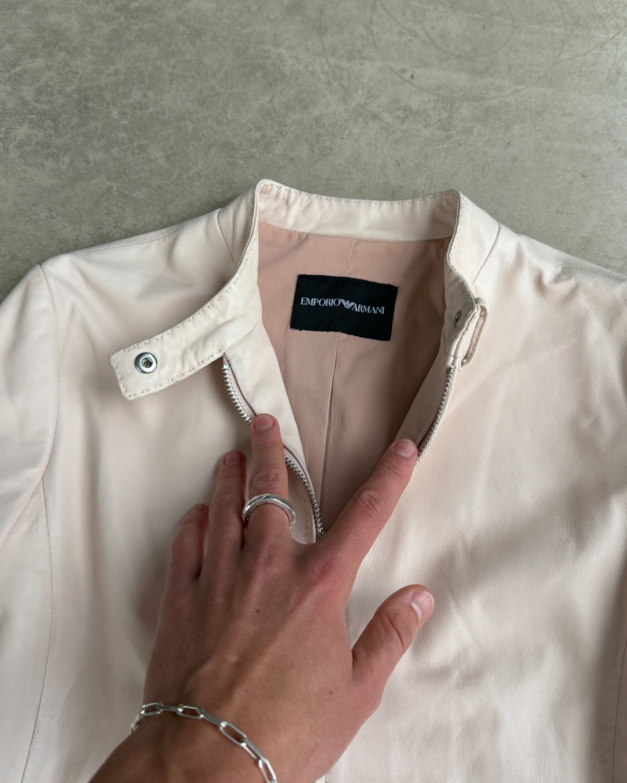 Emporio Armani Pink Lamb Leather Jacket – S-on a concrete background