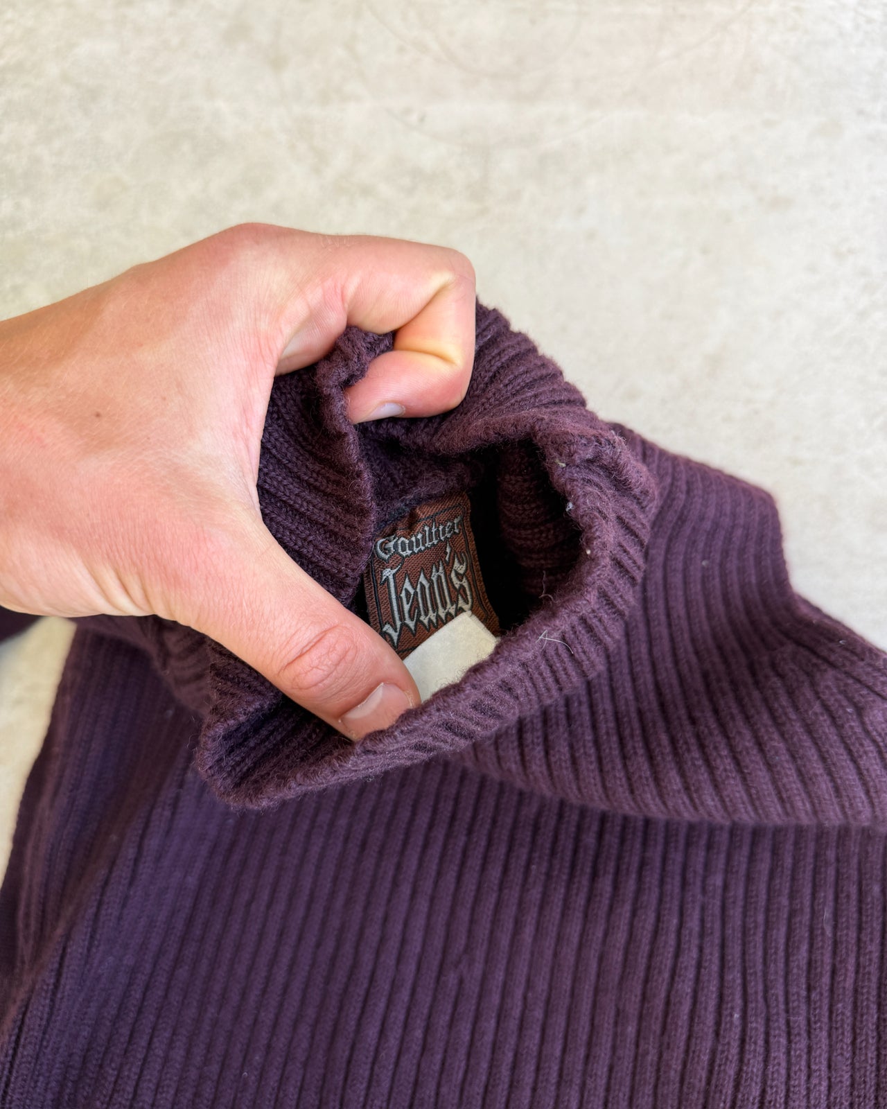 Jean Paul Gaultier Jeans 1990s Ribbed Sweatshirt with Removable Sleeves – S-on a concrete background