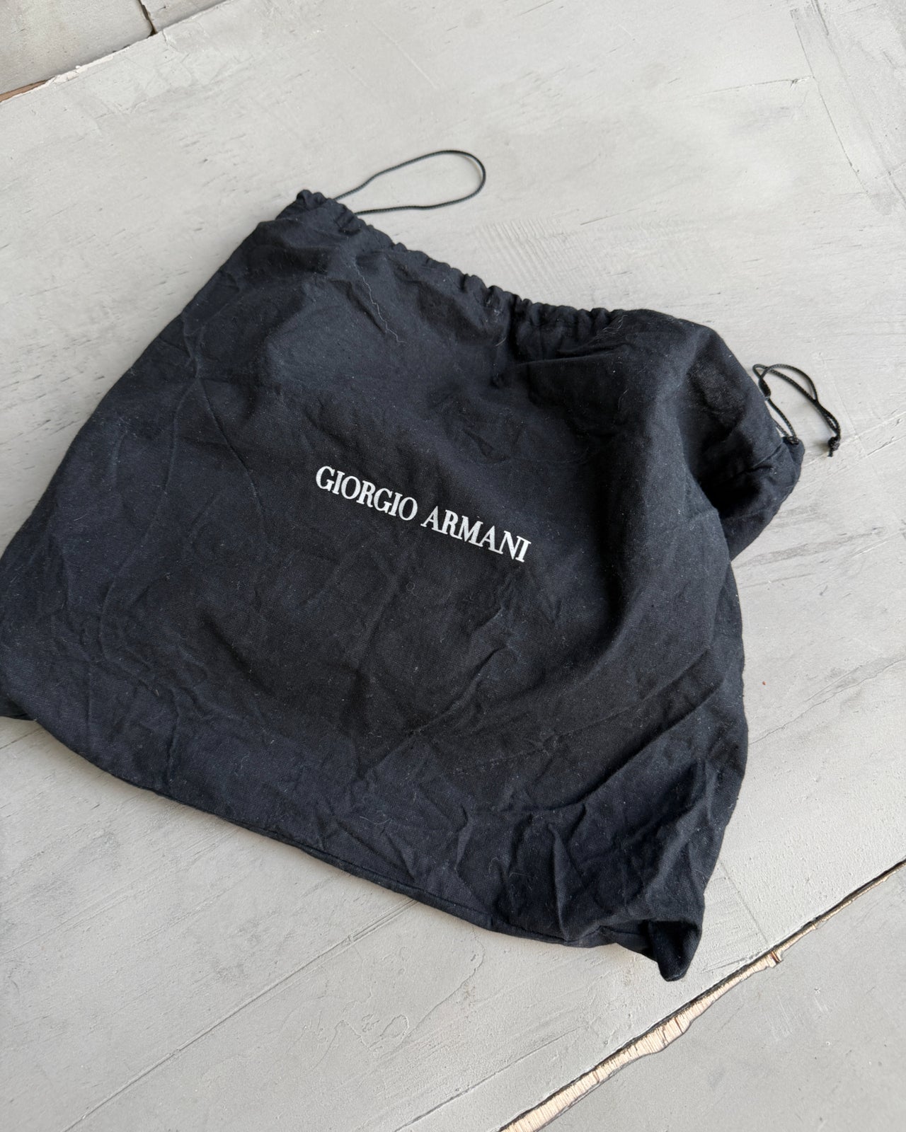 Alexander McQueen Faithful Multipocket Leather Shoulder Bag-on a concrete background
