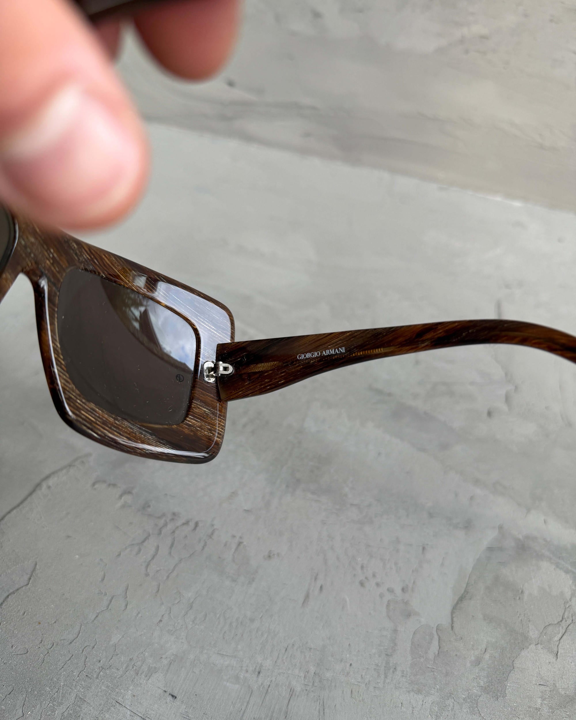 Giorgio Armani Oversized Frame Sunglasses-on a concrete background