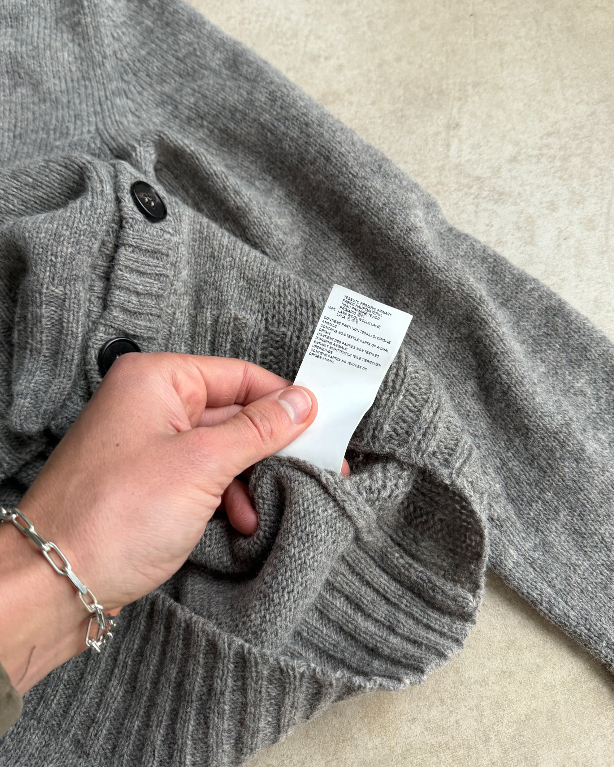 Maison Margiela 10 Wool Cardigan – S-on a concrete background