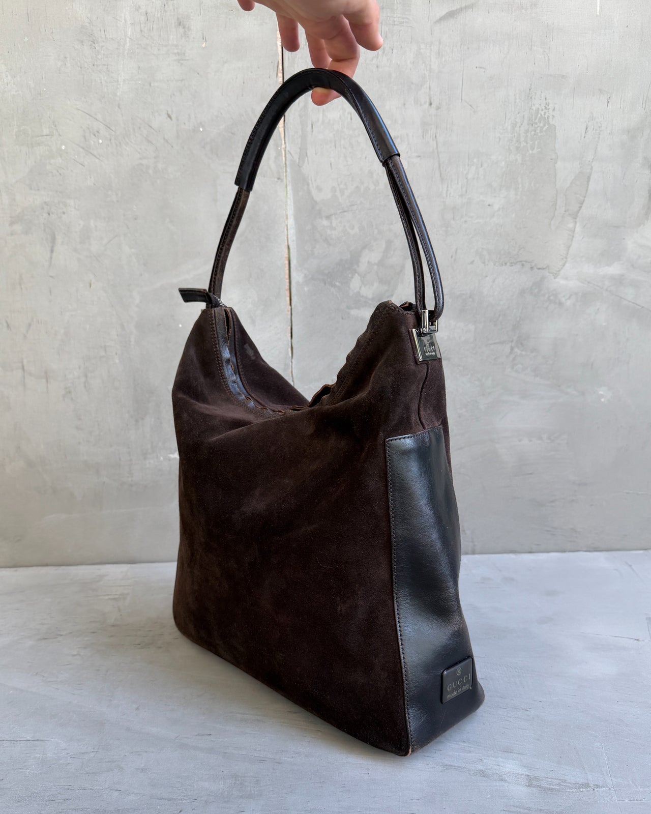 Gucci by Tom Ford Brown Suede and Leather Shoulder Bag-on a concrete background