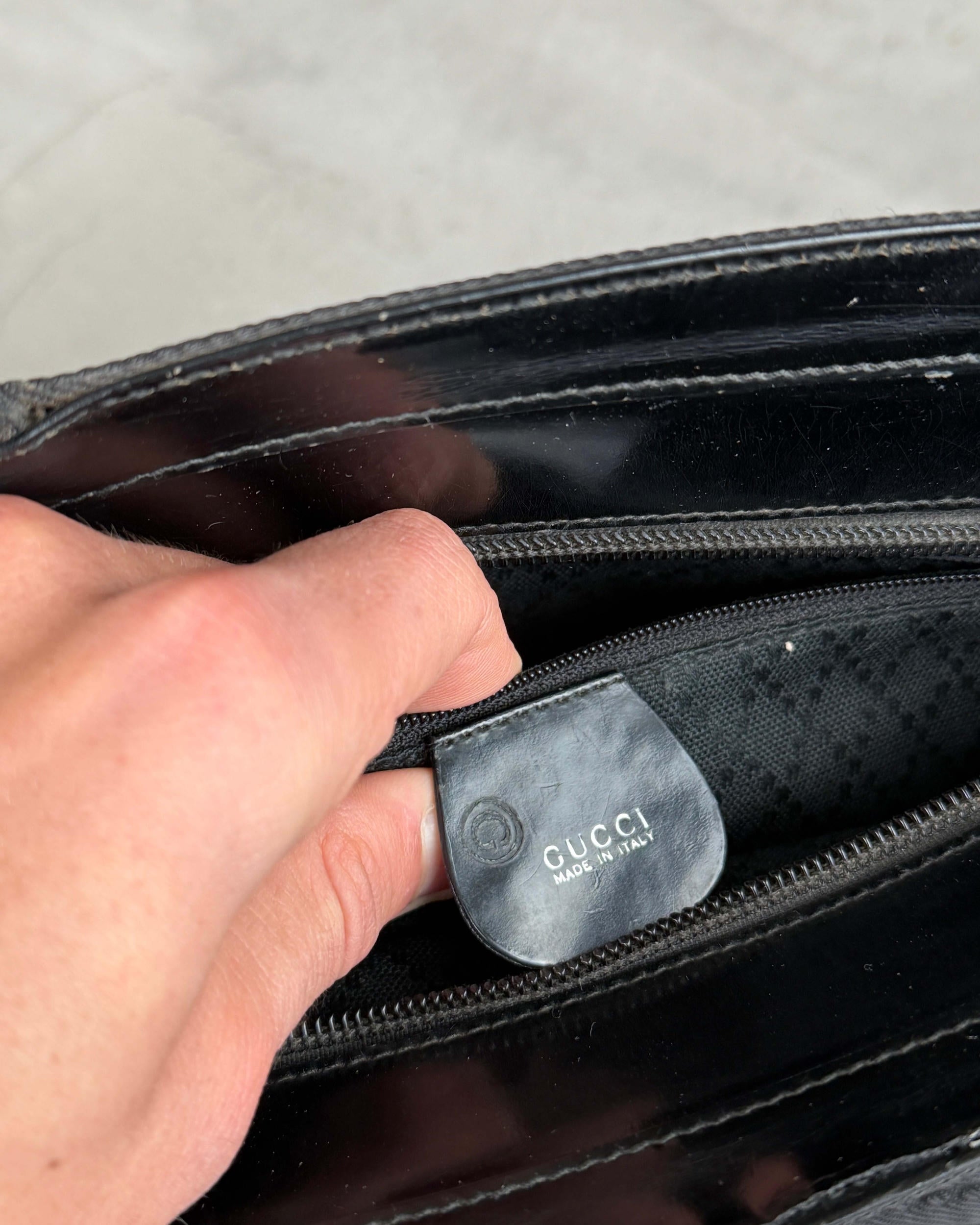 Gucci Bamboo Handle Handbag-on a concrete background