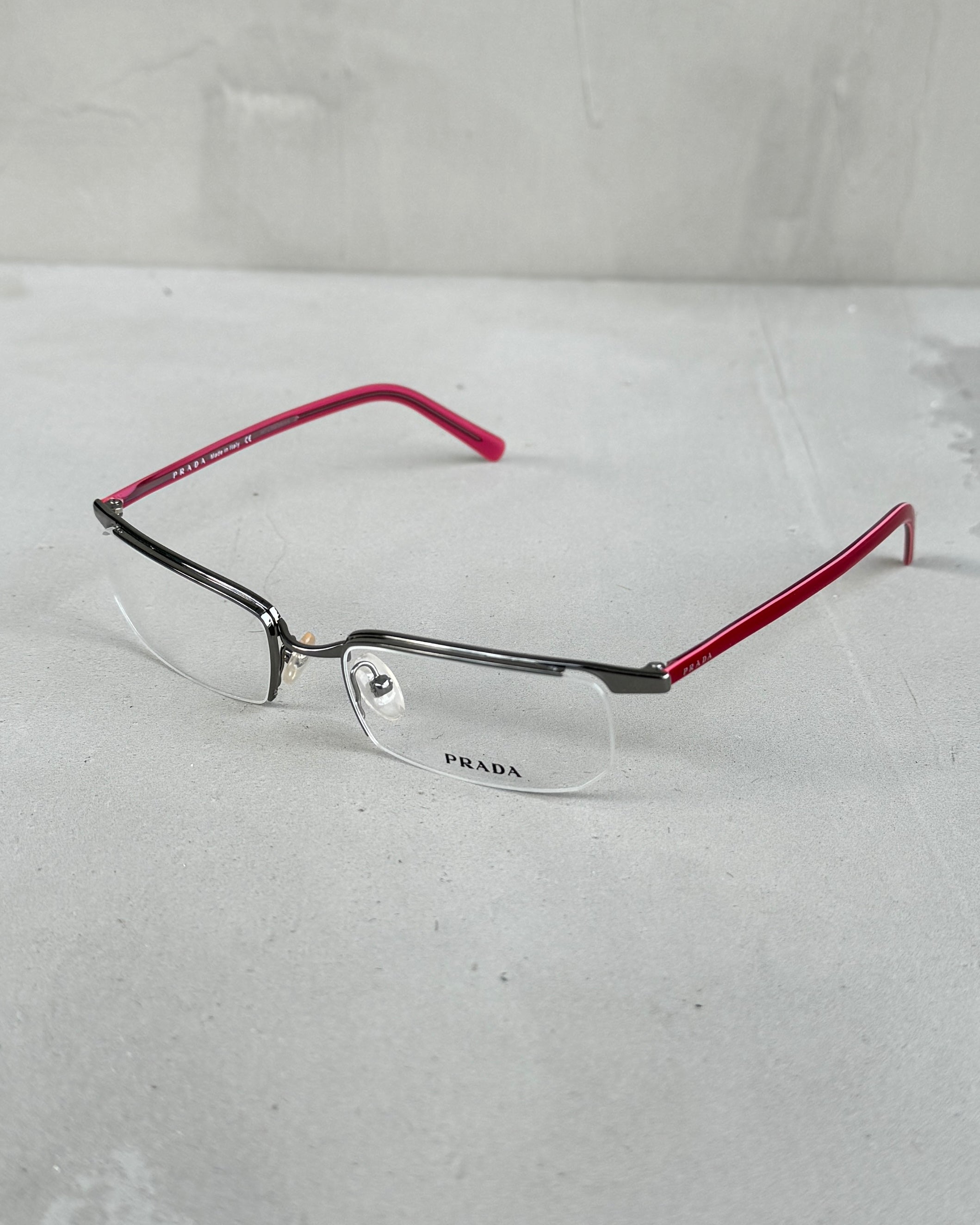 PRADA CLEAR LENS RIMLESS BAYONETTA EYE GLASSES