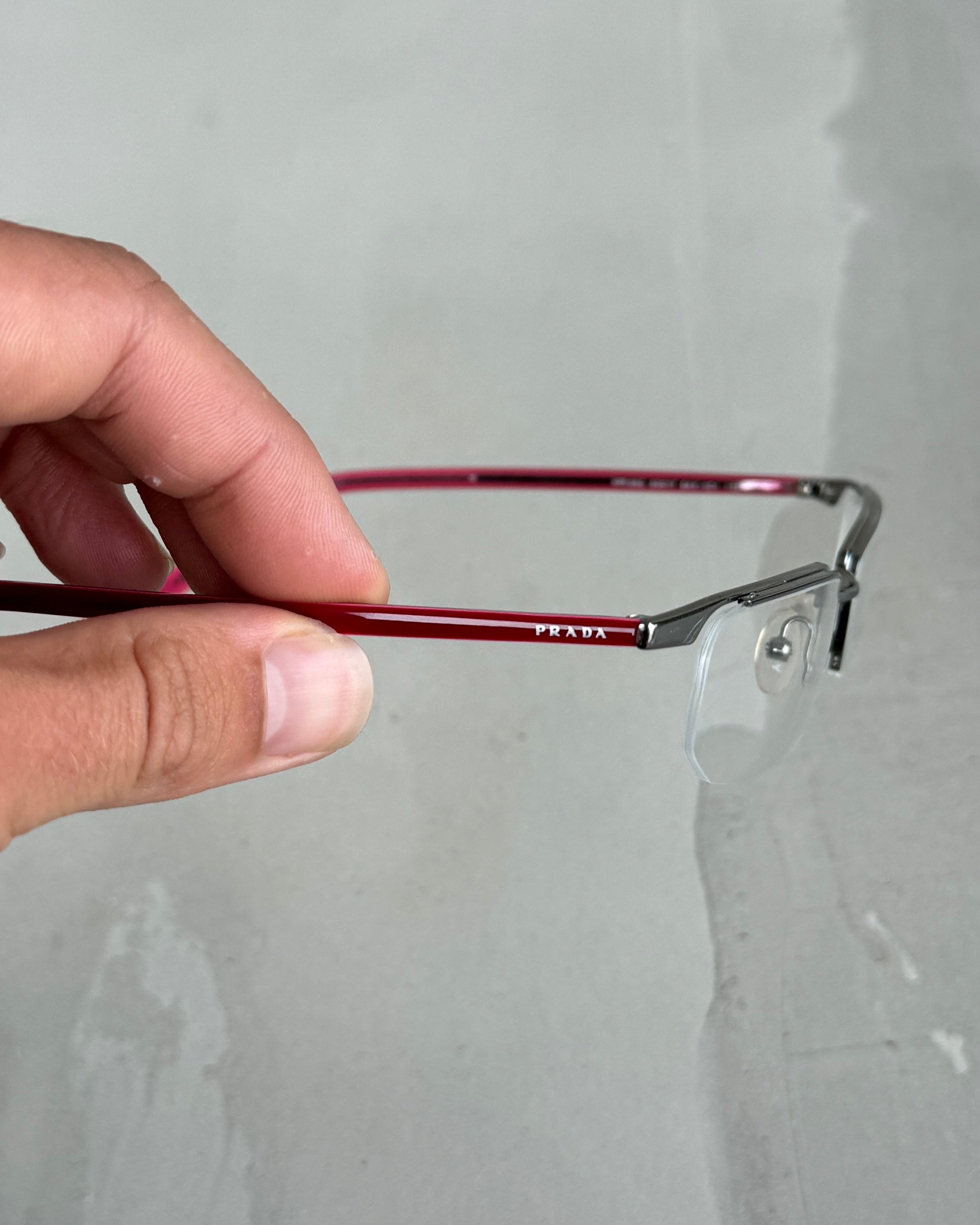 PRADA CLEAR LENS RIMLESS BAYONETTA EYE GLASSES