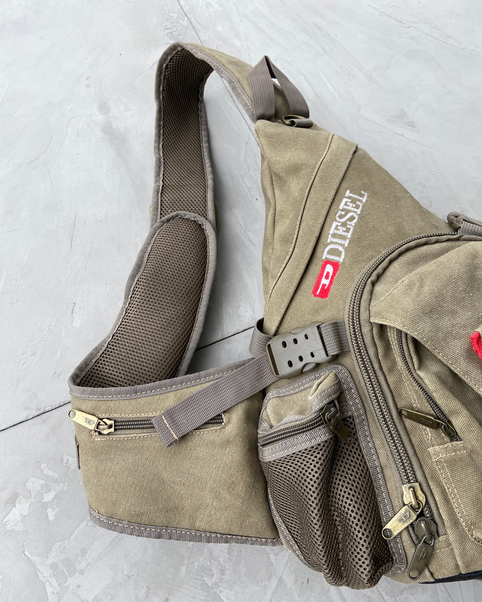 【archive】00s Diesel military sling bag IMG_9500_1600x.jpg?v=1689792144