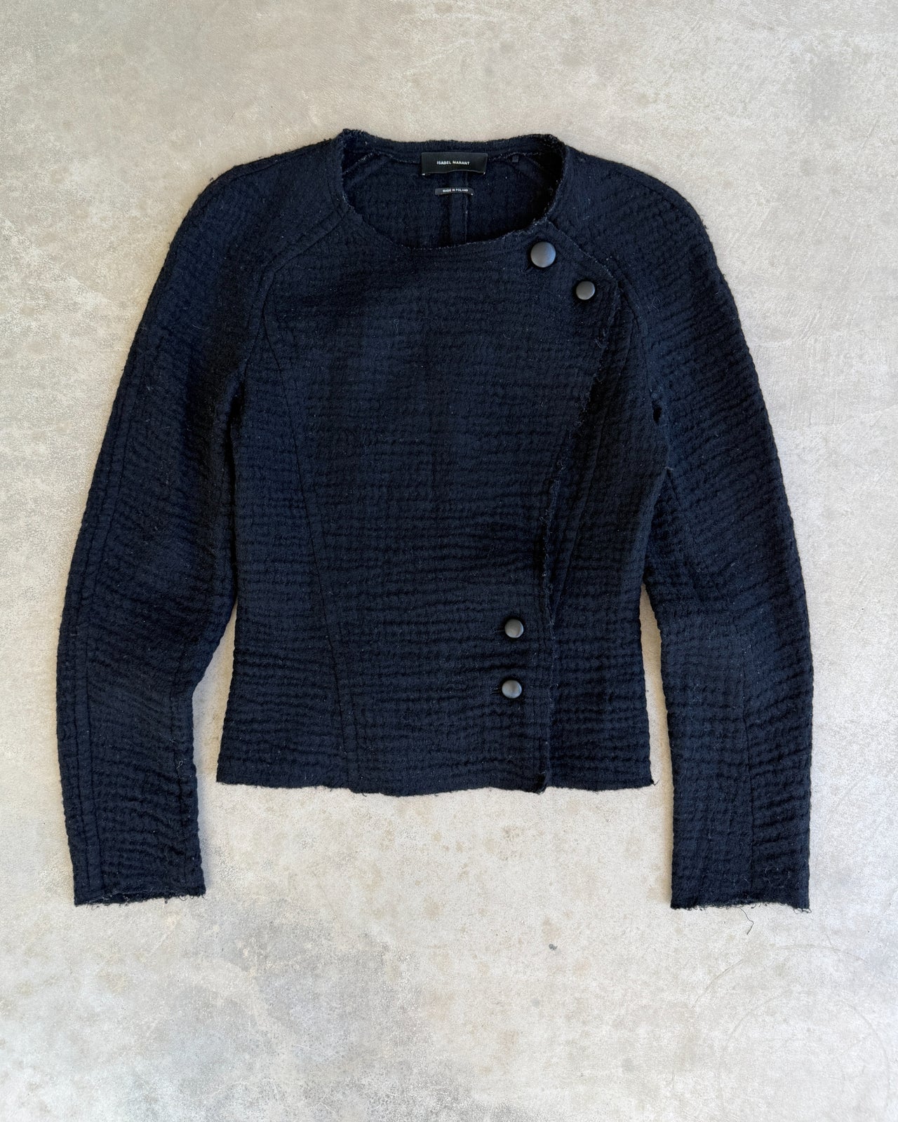 Isabel Marant Asymmetric Black Wool Jacket – S-on a concrete background