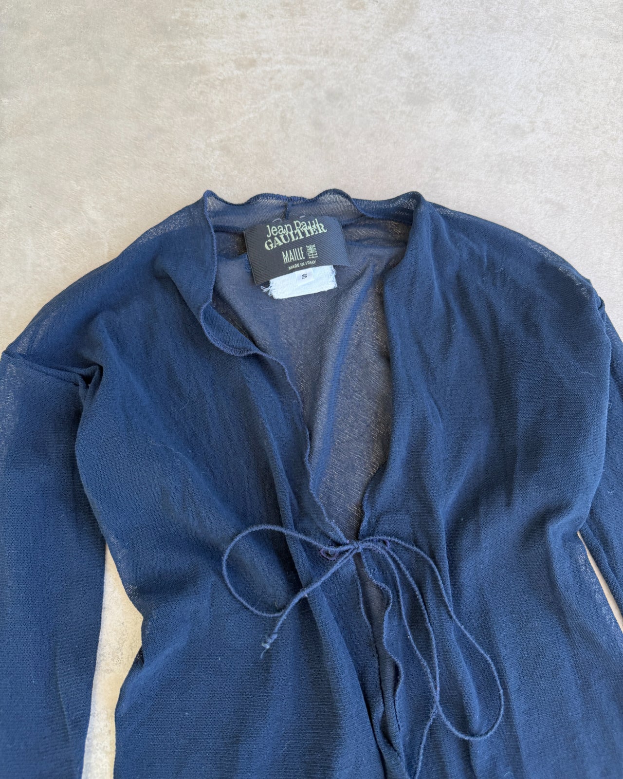 Jean Paul Gaultier Dark Blue Sheer Mesh Long Sleeve Cardigan Top – S-on a concrete background