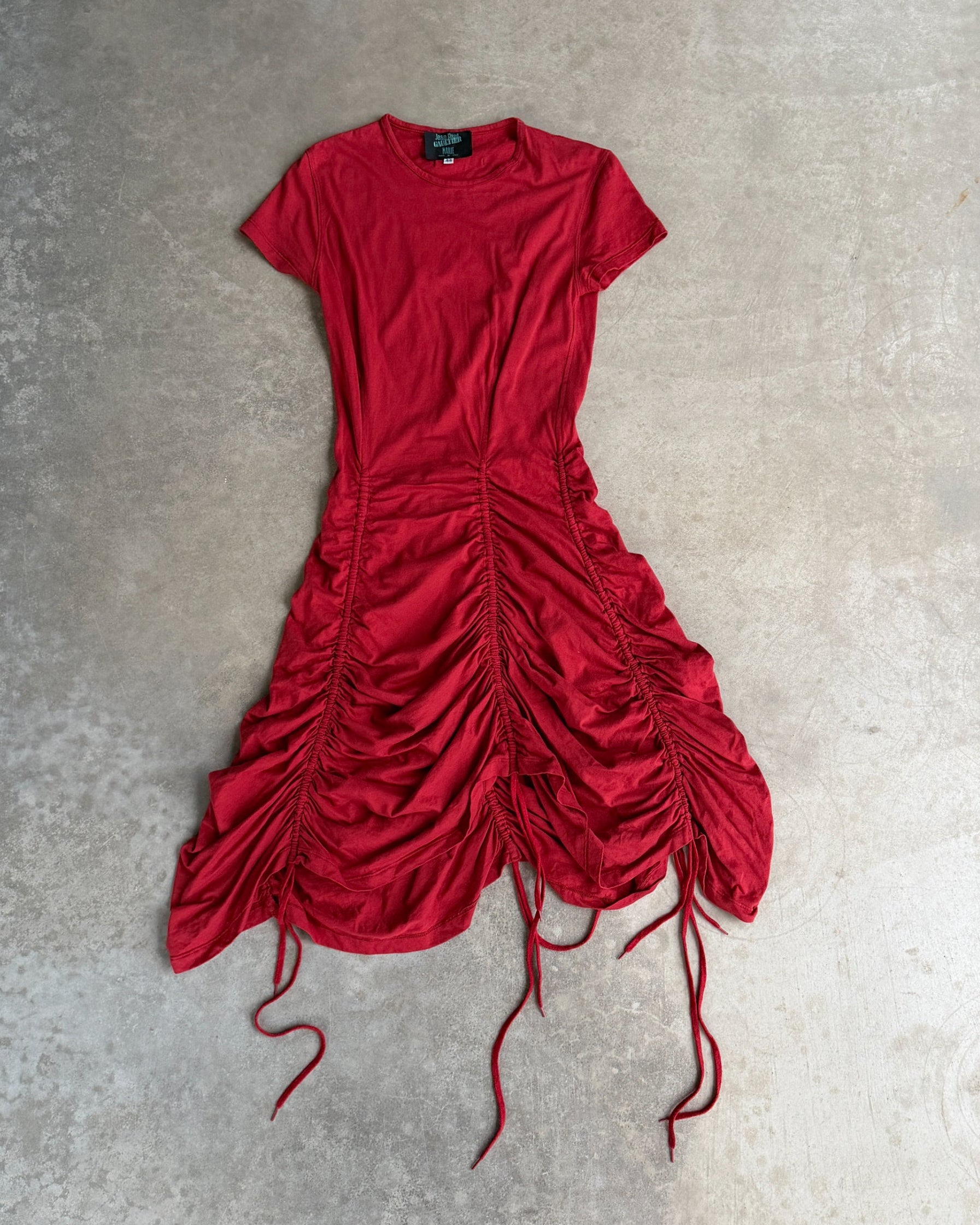Jean Paul Gaultier Maille Ruched Red Dress – L-on a concrete background
