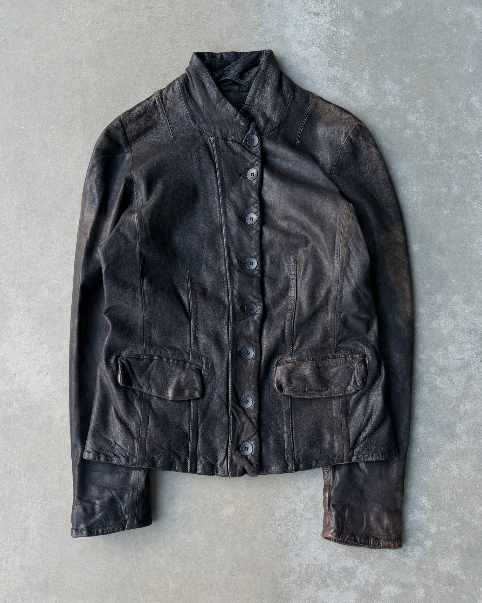AllSaints 1990s Button-Up Leather Jacket – M-on a concrete background