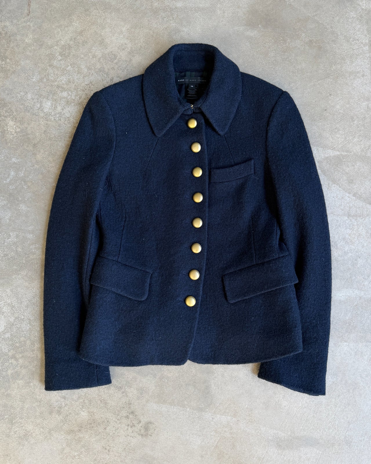 Marc by Marc Jacobs Military Inspired Wool Jacket – XS-on a concrete background