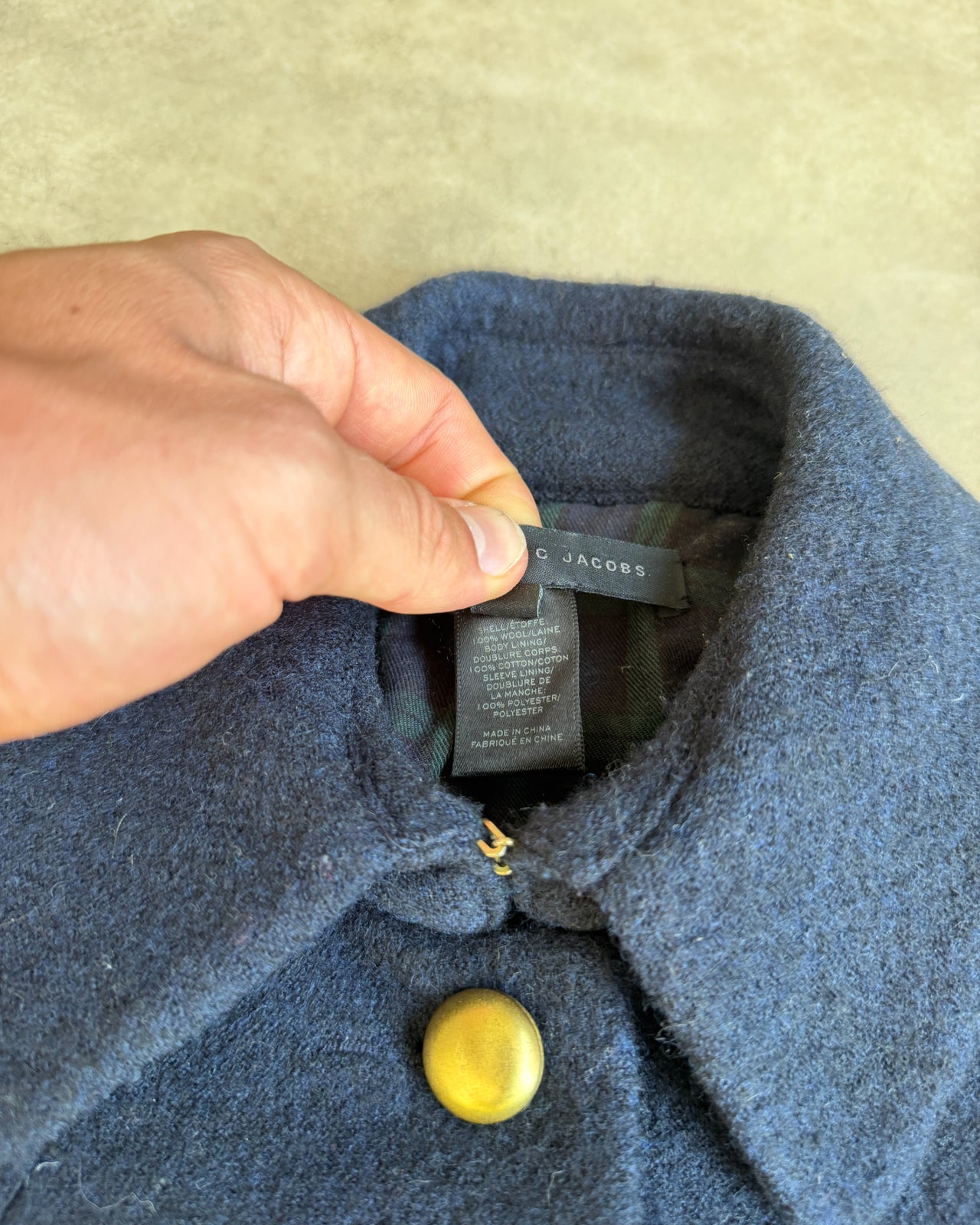 Marc by Marc Jacobs Military Inspired Wool Jacket – XS-on a concrete background