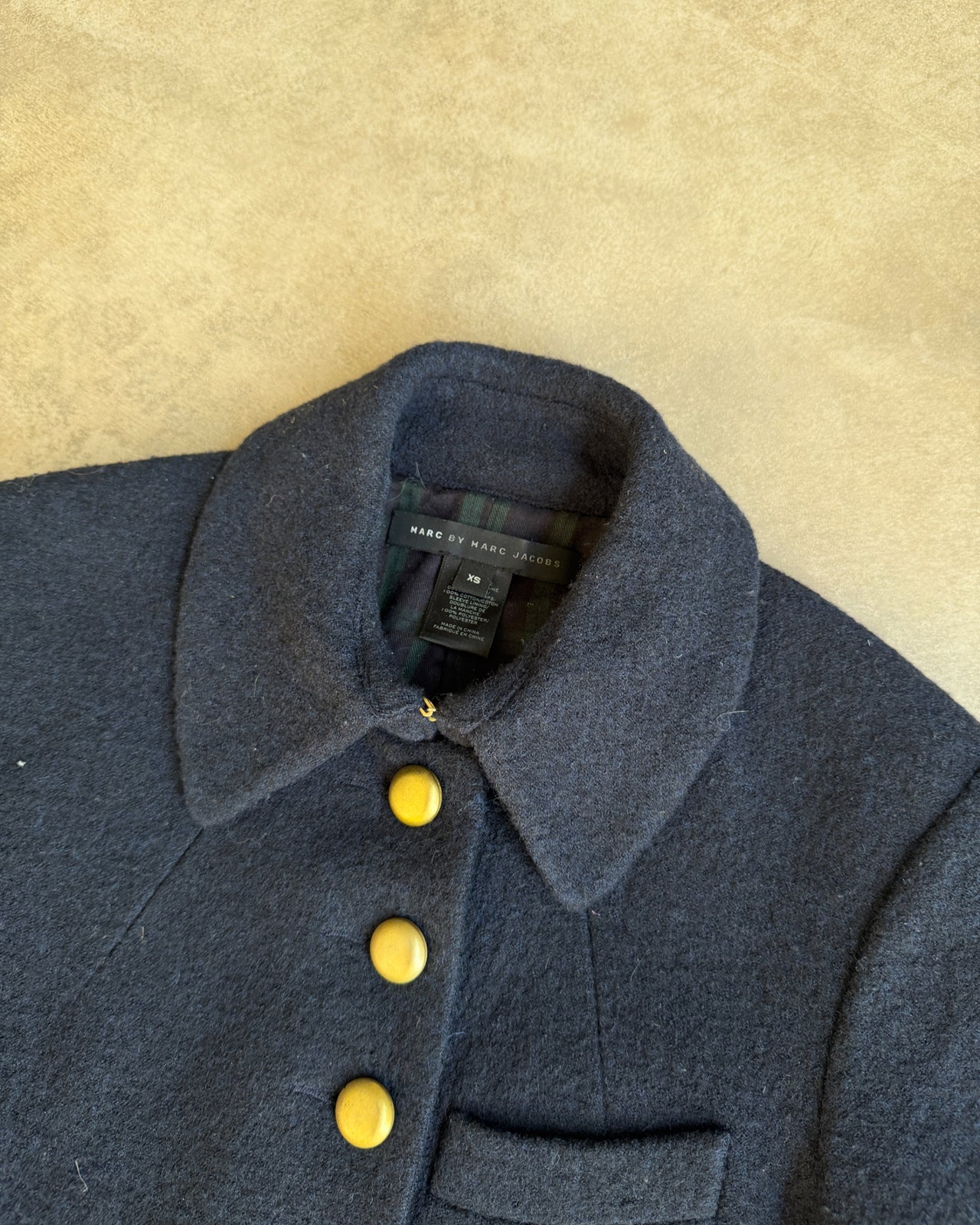 Marc by Marc Jacobs Military Inspired Wool Jacket – XS-on a concrete background