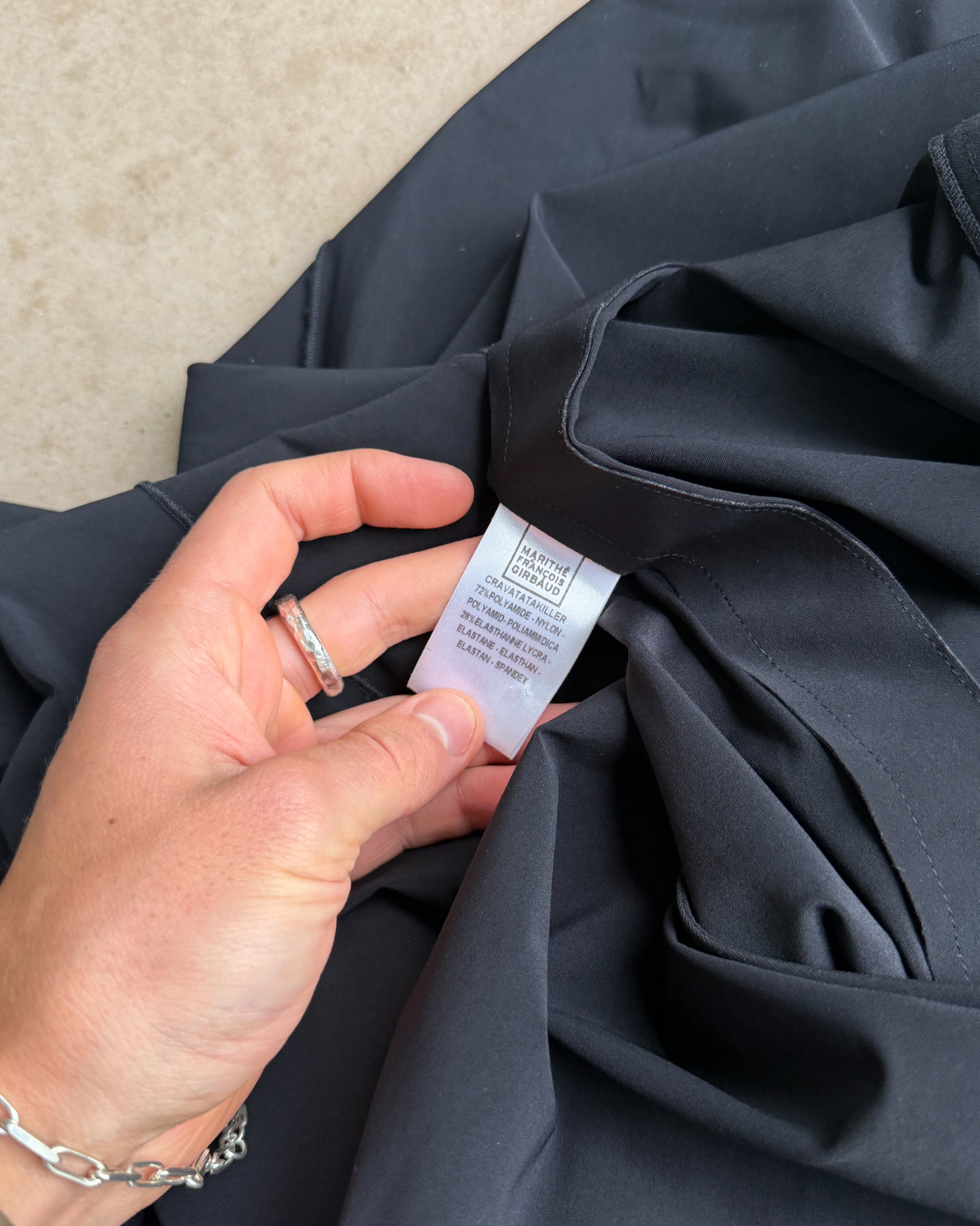 Marithé + François Girbaud Asymmetric Maxi Skirt – S-on a concrete background