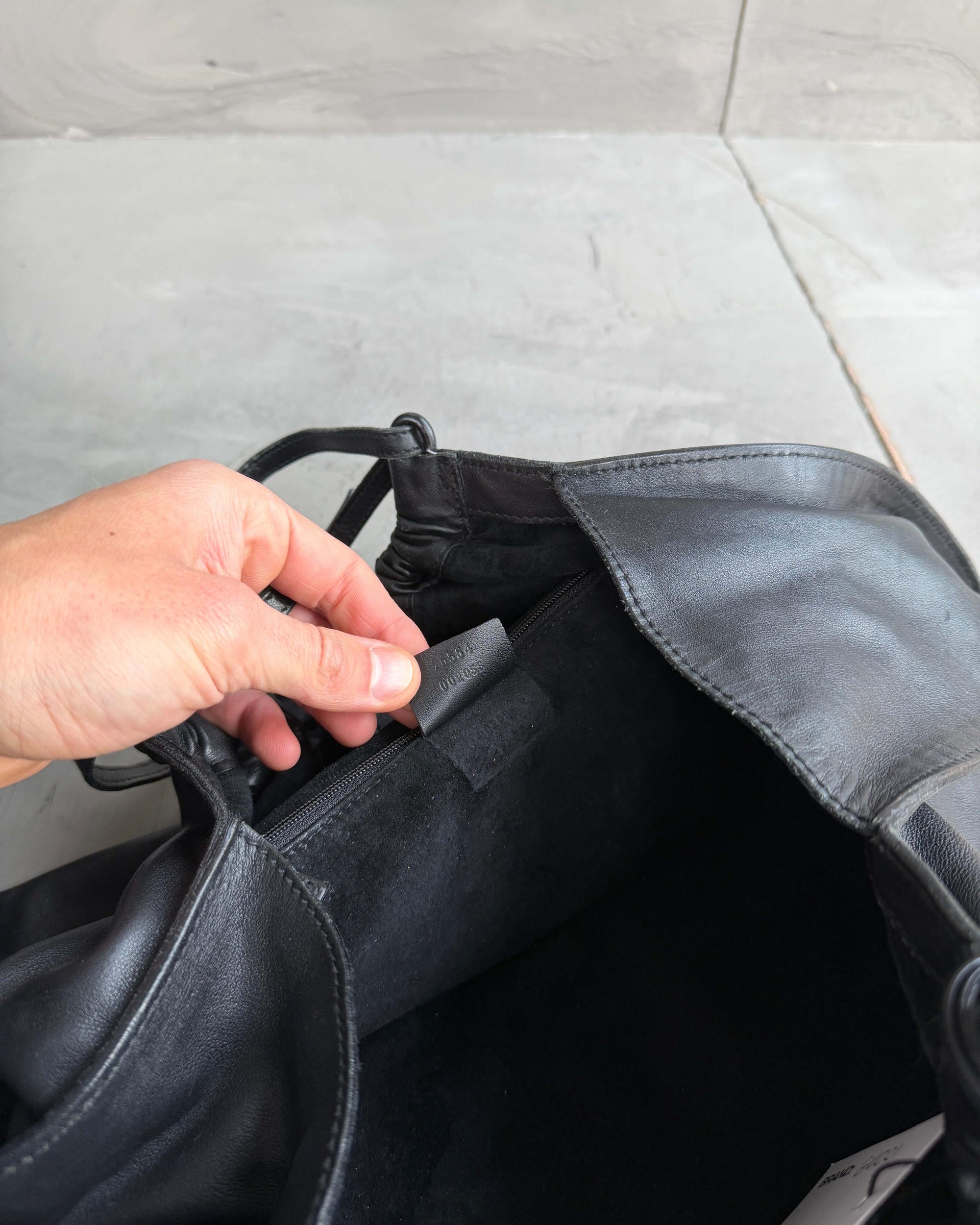 Gucci by Tom Ford Ruched Leather Shoulder Bag-on a concrete background