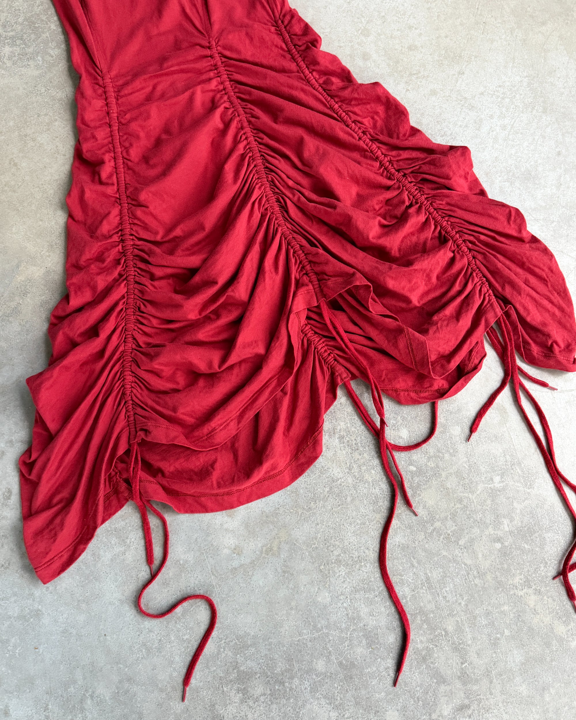 Jean Paul Gaultier Maille Ruched Red Dress – L-on a concrete background