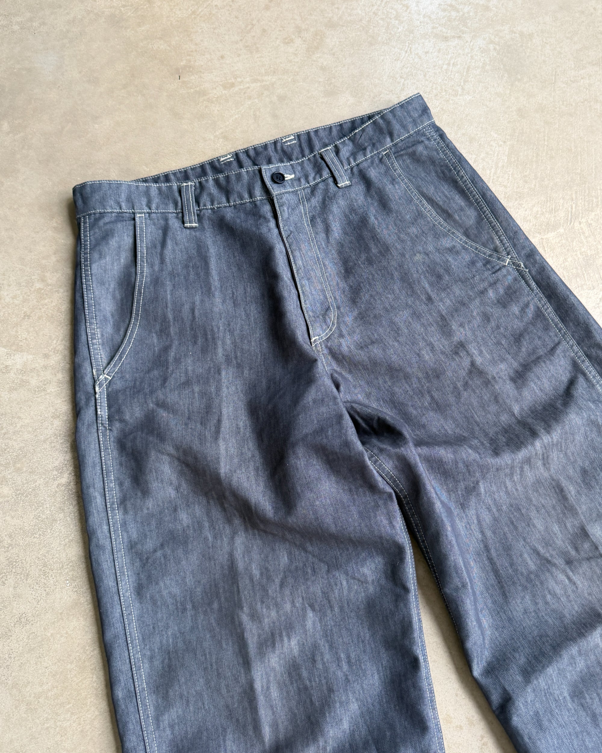 Issey Miyake AW2003 Wide Leg Chambray Denim Trousers – W33–34-on a concrete background