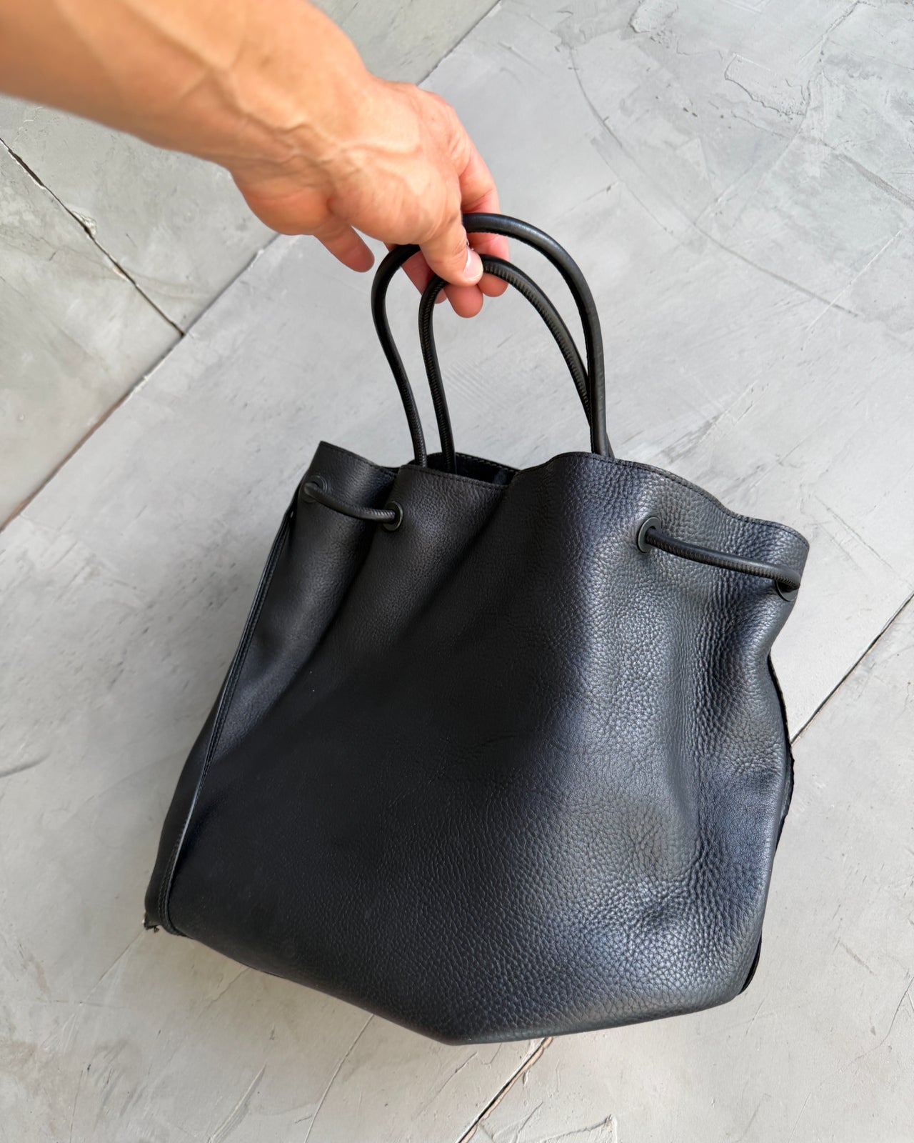 Gucci by Tom Ford Black Suede Leather Shoulder Bag-on a concrete background