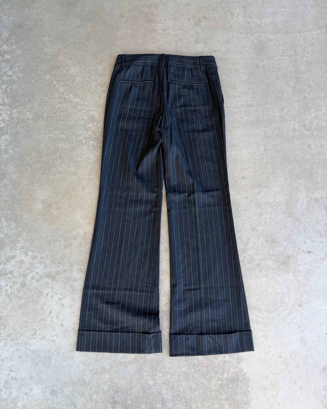 Calvin Klein Grey Pinstripe Suit – XS/S-on a concrete background